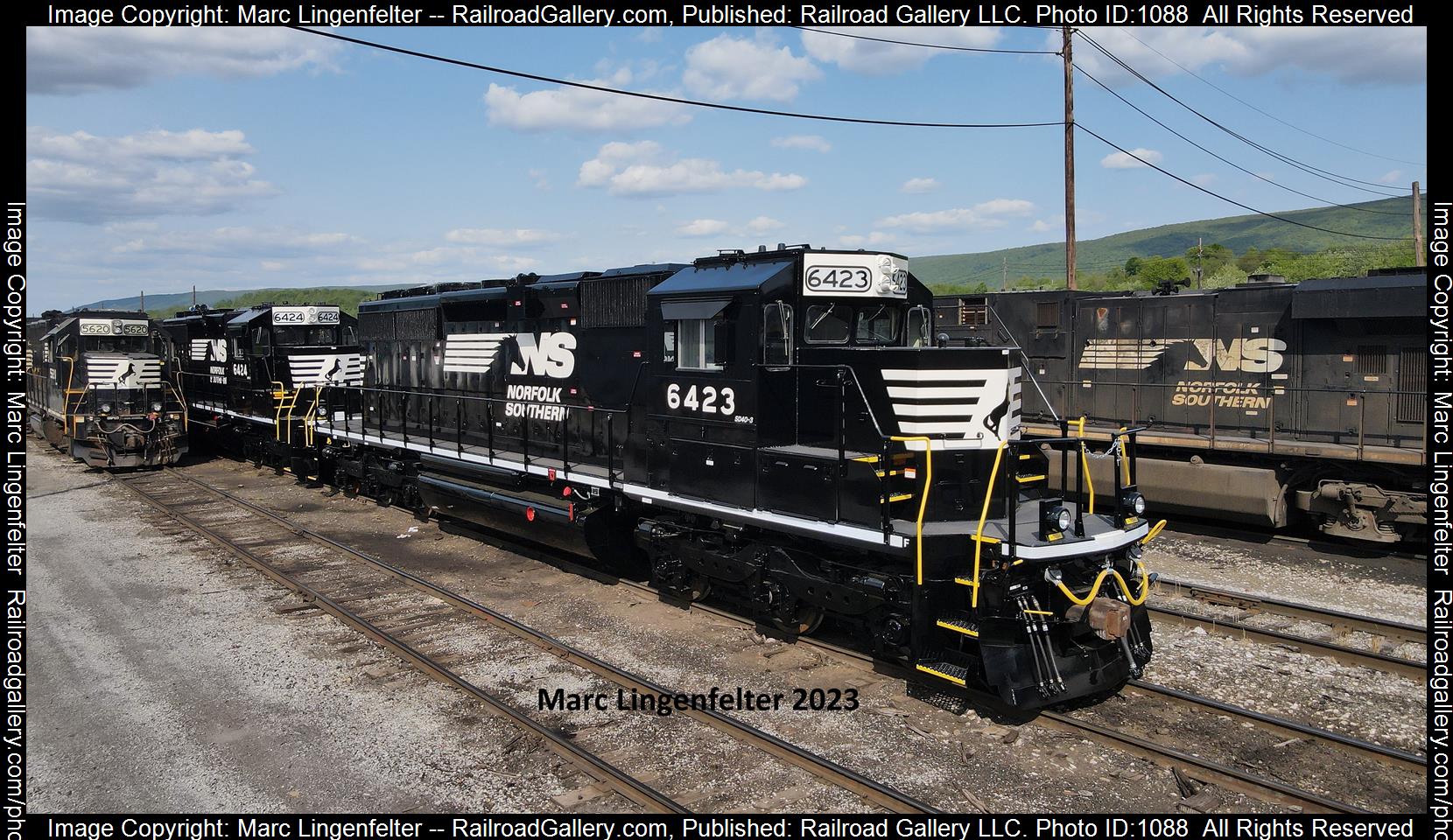 NS 6423 is a class EMD SD40-3 and  is pictured in Altoona, Pennsylvania, USA.  This was taken along the NS Juniata Shops on the Norfolk Southern. Photo Copyright: Marc Lingenfelter uploaded to Railroad Gallery on 05/22/2023. This photograph of NS 6423 was taken on Tuesday, May 23, 2023. All Rights Reserved. 