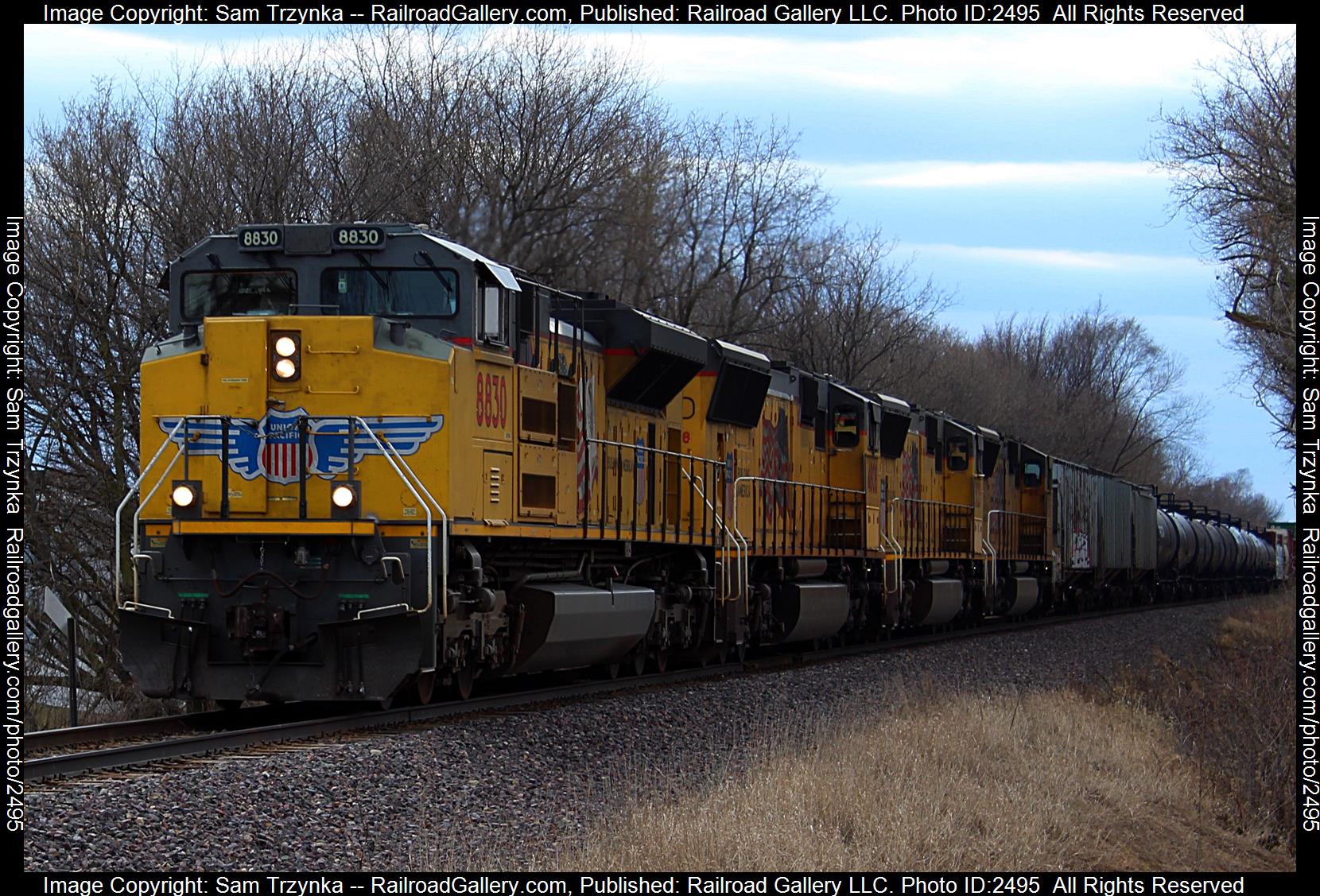 UP 8830 is a class EMD SD70ACe and  is pictured in Rosemount, Minnesota, USA.  This was taken along the UP Albert Lea Subdivision on the Union Pacific Railroad. Photo Copyright: Sam Trzynka uploaded to Railroad Gallery on 11/26/2023. This photograph of UP 8830 was taken on Sunday, April 10, 2022. All Rights Reserved. 