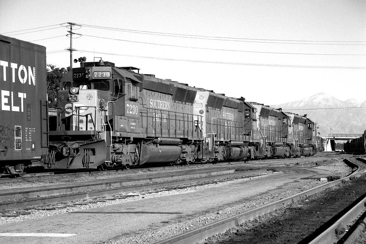 SP 7230 is a class EMD GP40X and  is pictured in West Colton, California, USA.  This was taken along the Colton/SP on the Southern Pacific Transportation Company. Photo Copyright: Rick Doughty uploaded to Railroad Gallery on 01/05/2024. This photograph of SP 7230 was taken on Thursday, November 21, 1985. All Rights Reserved. 