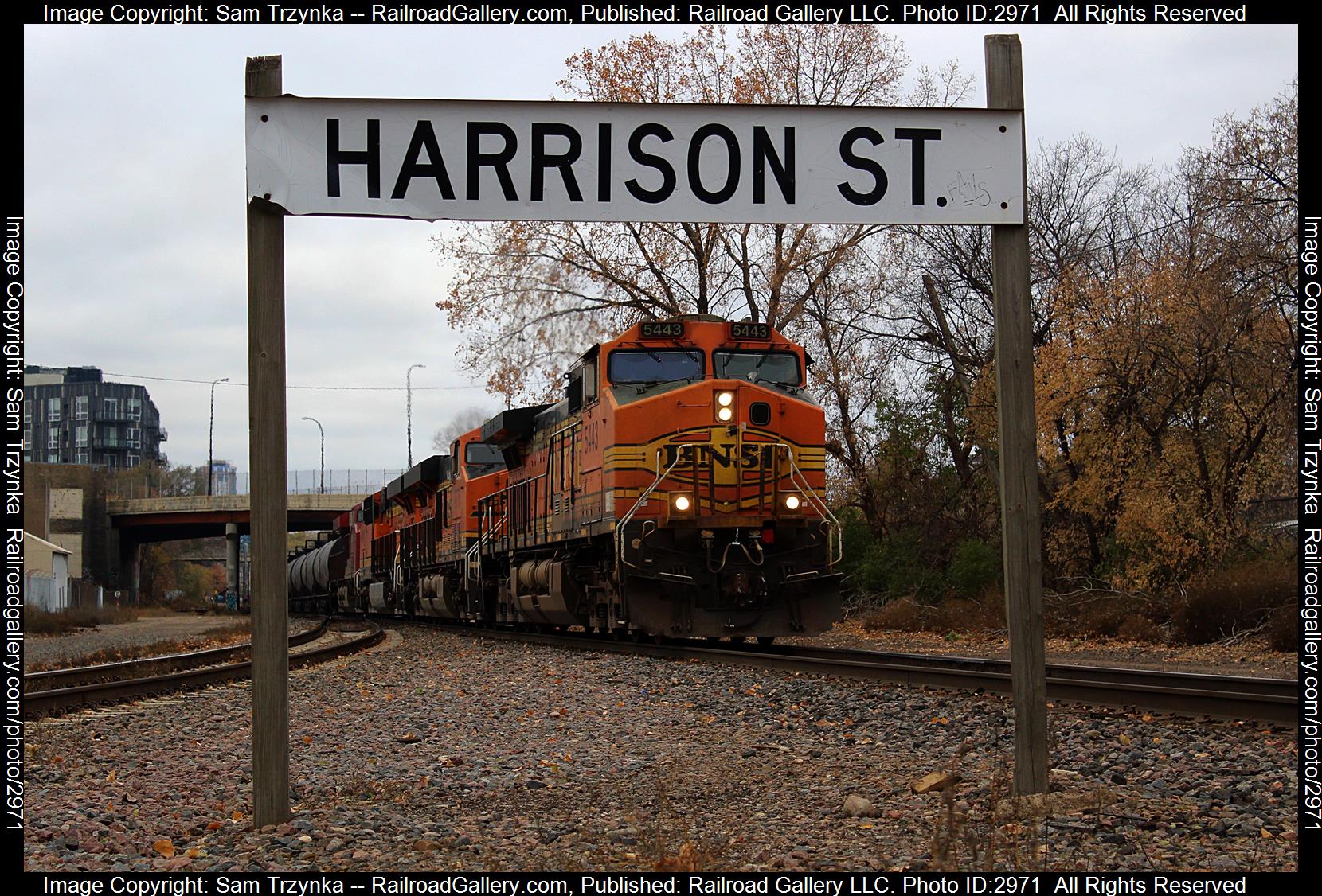BNSF 5443 is a class GE C44-9W (Dash 9-44CW) and  is pictured in Minneapolis, Minnesota, USA.  This was taken along the BNSF Wayzata Subdivision on the BNSF Railway. Photo Copyright: Sam Trzynka uploaded to Railroad Gallery on 01/16/2024. This photograph of BNSF 5443 was taken on Friday, November 10, 2023. All Rights Reserved. 