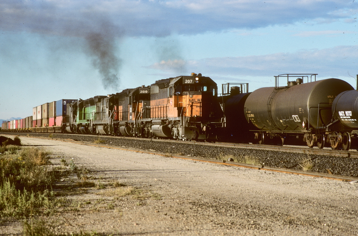 MILW 207 is a class EMD SD40-2 and  is pictured in Dragoon, Arizona, USA.  This was taken along the Lordsburg/SP on the Milwaukee Road. Photo Copyright: Rick Doughty uploaded to Railroad Gallery on 01/18/2024. This photograph of MILW 207 was taken on Saturday, November 14, 1987. All Rights Reserved. 
