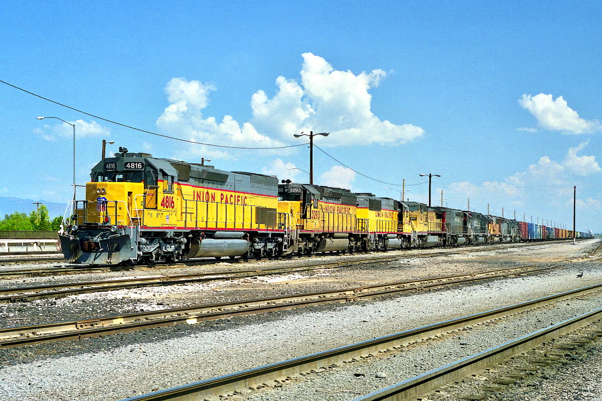 UP 4816 is a class EMD SD45T-2 and  is pictured in Tucson, Arizona, USA.  This was taken along the Lordsburg/UP on the Union Pacific Railroad. Photo Copyright: Rick Doughty uploaded to Railroad Gallery on 02/06/2024. This photograph of UP 4816 was taken on Monday, August 23, 1999. All Rights Reserved. 