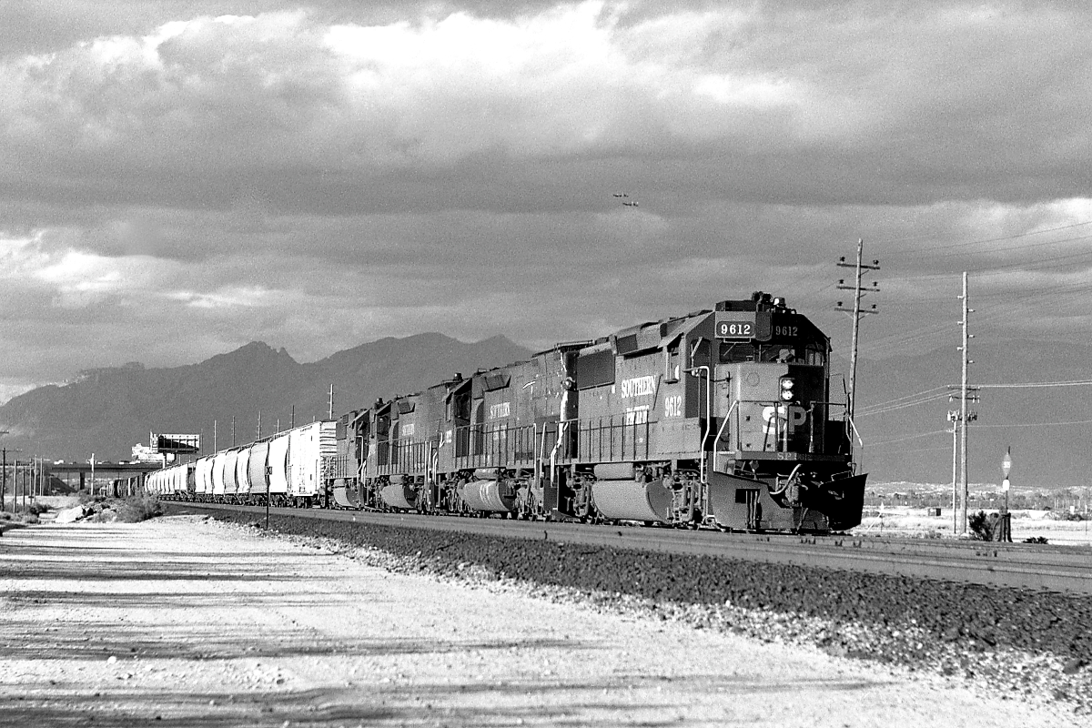 SP 9612 is a class EMD GP60 and  is pictured in Tucson, Arizona, USA.  This was taken along the Lordsburg/SP on the Southern Pacific Transportation Company. Photo Copyright: Rick Doughty uploaded to Railroad Gallery on 02/13/2024. This photograph of SP 9612 was taken on Saturday, September 09, 1989. All Rights Reserved. 