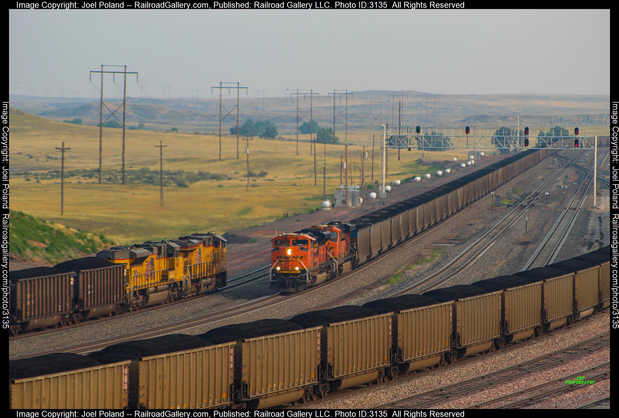 BNSF 9076 is a class EMD SD70ACe and  is pictured in Converse Junction, Wyoming, USA.  This was taken along the Orin Sub on the BNSF Railway. Photo Copyright: Joel Poland uploaded to Railroad Gallery on 02/20/2024. This photograph of BNSF 9076 was taken on Saturday, July 31, 2021. All Rights Reserved. 