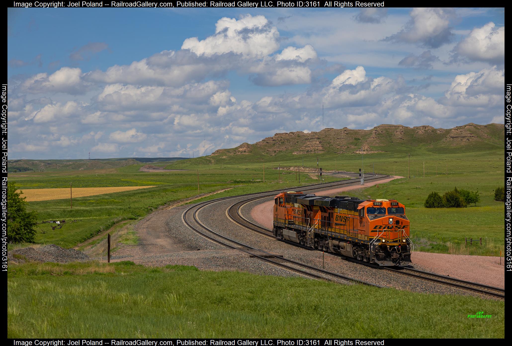 BNSF 6104 is a class GE ES44AC and  is pictured in Vance, Nebraska, USA.  This was taken along the Angora Sub on the BNSF Railway. Photo Copyright: Joel Poland uploaded to Railroad Gallery on 02/27/2024. This photograph of BNSF 6104 was taken on Friday, June 02, 2023. All Rights Reserved. 