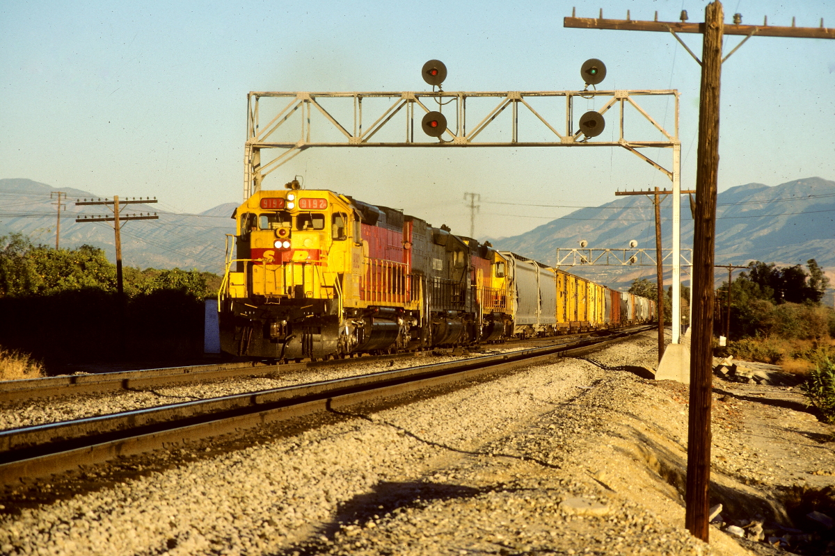 SP 9192 is a class EMD SD45T-2 and  is pictured in Redlands, California, USA.  This was taken along the Yuma/SP on the Southern Pacific Transportation Company. Photo Copyright: Rick Doughty uploaded to Railroad Gallery on 03/06/2024. This photograph of SP 9192 was taken on Wednesday, November 13, 1985. All Rights Reserved. 