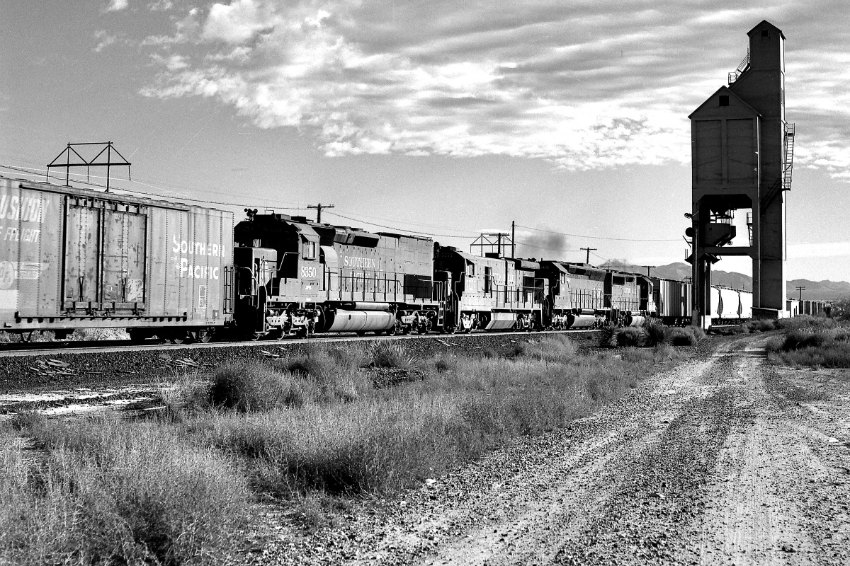 SP 8350 is a class EMD SD40T-2 and  is pictured in Mescal, Arizona, USA.  This was taken along the Lordsburg/SP on the Southern Pacific Transportation Company. Photo Copyright: Rick Doughty uploaded to Railroad Gallery on 03/12/2024. This photograph of SP 8350 was taken on Saturday, November 14, 1987. All Rights Reserved. 