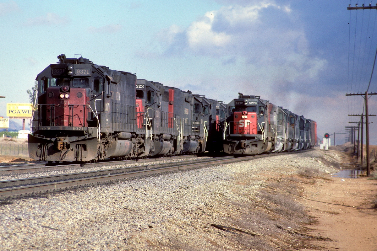 SSW 9371 is a class EMD SD45T-2 and  is pictured in Beaumont, California, USA.  This was taken along the Yuma/SP on the Southern Pacific Transportation Company. Photo Copyright: Rick Doughty uploaded to Railroad Gallery on 04/06/2024. This photograph of SSW 9371 was taken on Saturday, November 30, 1985. All Rights Reserved. 