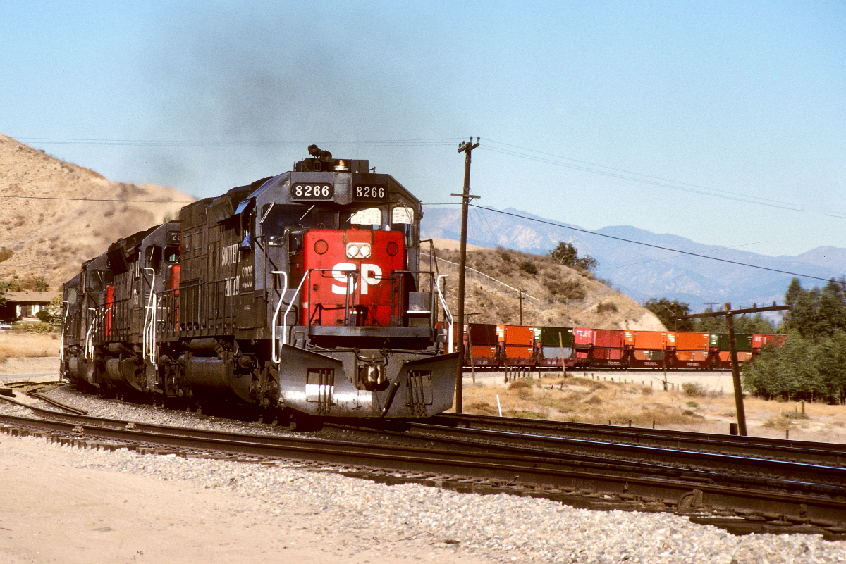 SP 8266 is a class EMD SD40T-2 and  is pictured in El Casco, California, USA.  This was taken along the Yuma/SP on the Southern Pacific Transportation Company. Photo Copyright: Rick Doughty uploaded to Railroad Gallery on 04/09/2024. This photograph of SP 8266 was taken on Saturday, March 24, 1990. All Rights Reserved. 