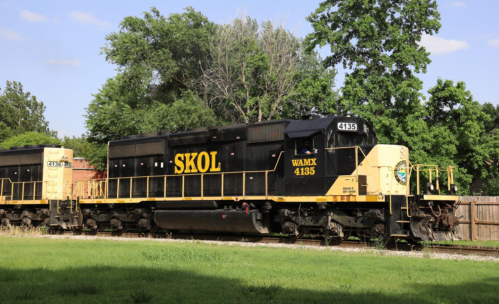 WAMX 4135 is a class EMD SD40-2 and  is pictured in Wichita, Kansas, USA.  This was taken along the K&O Mainline on the South Kansas and Oklahoma Railroad. Photo Copyright: Marc Lingenfelter uploaded to Railroad Gallery on 12/08/2022. This photograph of WAMX 4135 was taken on Tuesday, June 14, 2022. All Rights Reserved. 