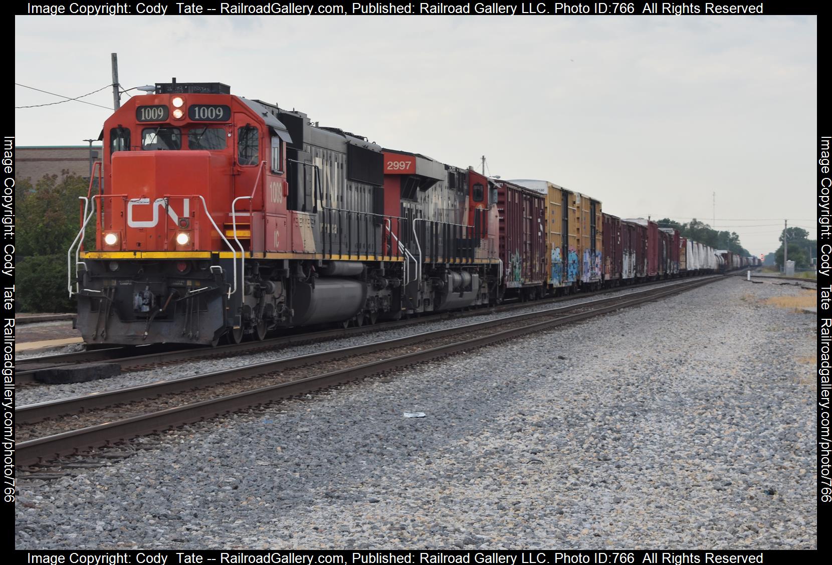 IC 1009 is a class EMD SD70 and  is pictured in Centralia, Illinois, USA.  This was taken along the Centralia subdivision  on the Canadian National Railway. Photo Copyright: Cody  Tate uploaded to Railroad Gallery on 02/26/2023. This photograph of IC 1009 was taken on Saturday, September 10, 2022. All Rights Reserved. 