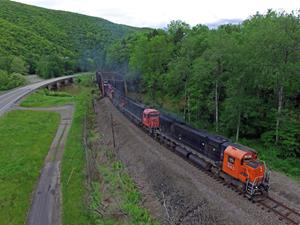 A trio of M636s and a C630m cross the Sinnemahoning Creek