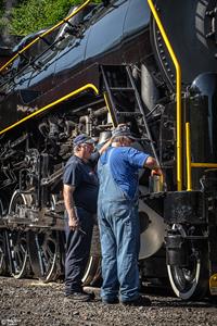 The Fredericksons Preparing the Air Compressors