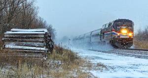 Amtrak 281 kicking up the snow