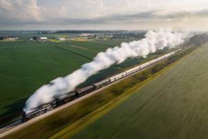 NKP 765 Blurs Past Farm