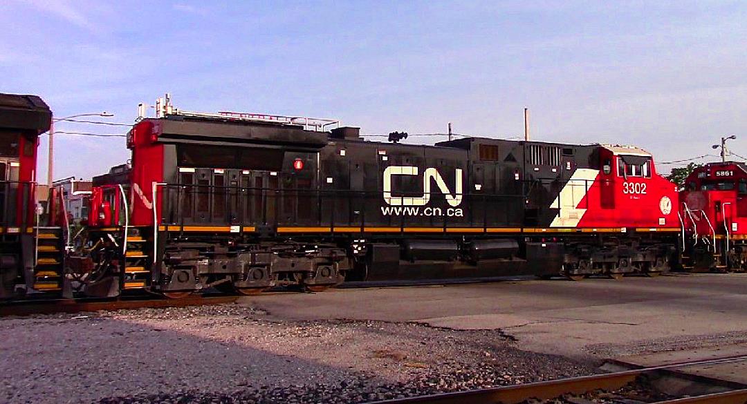 CN 3302 is a class GE AC44C6M and  is pictured in Centralia, Illinois, USA.  This was taken along the CN Centralia subdivision on the Canadian National Railway. Photo Copyright: Blaise Lambert uploaded to Railroad Gallery on 04/27/2023. This photograph of CN 3302 was taken on Wednesday, April 26, 2023. All Rights Reserved. 