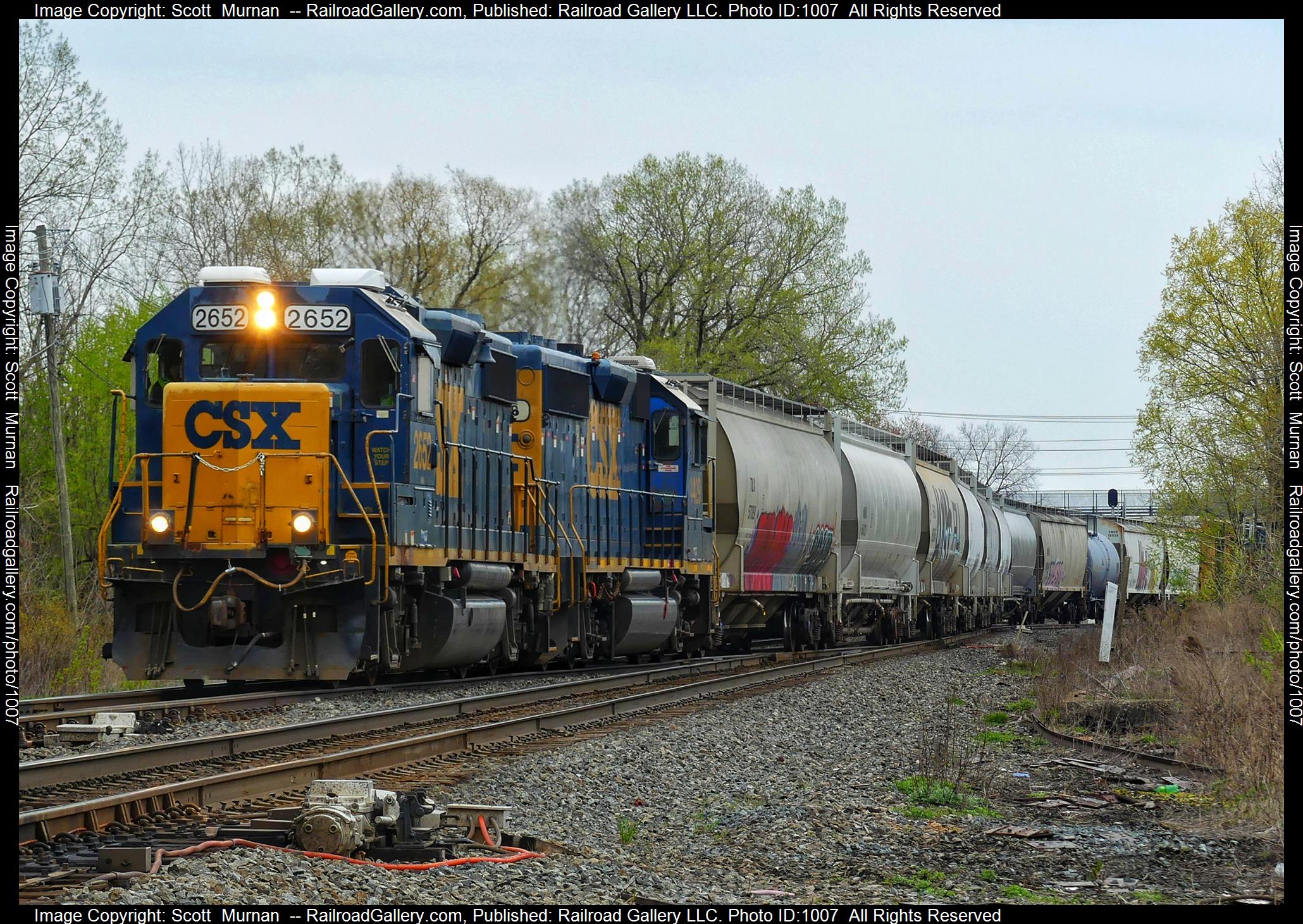 CSX 2652 is a class EMD GP38-2 and  is pictured in Perinton , New York, United States.  This was taken along the Rochester Subdivision  on the CSX Transportation. Photo Copyright: Scott  Murnan  uploaded to Railroad Gallery on 04/28/2023. This photograph of CSX 2652 was taken on Friday, April 28, 2023. All Rights Reserved. 