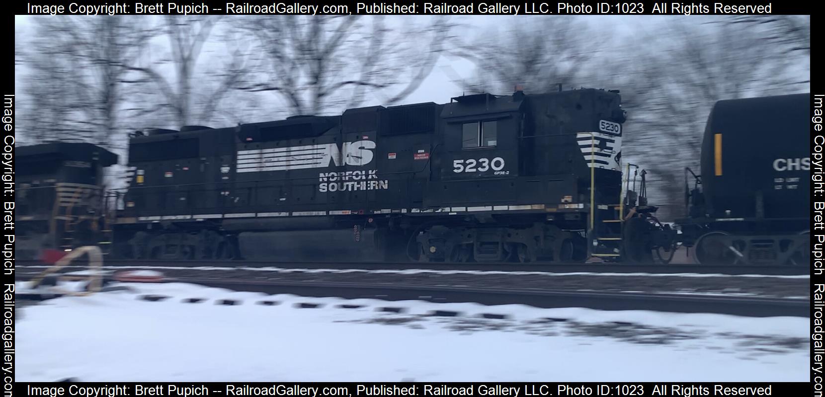 NS 5230 is a class GP38-2 and  is pictured in Portage, PA, United States.  This was taken along the Pittsburgh Line on the Norfolk Southern. Photo Copyright: Brett Pupich uploaded to Railroad Gallery on 05/02/2023. This photograph of NS 5230 was taken on Tuesday, May 02, 2023. All Rights Reserved. 