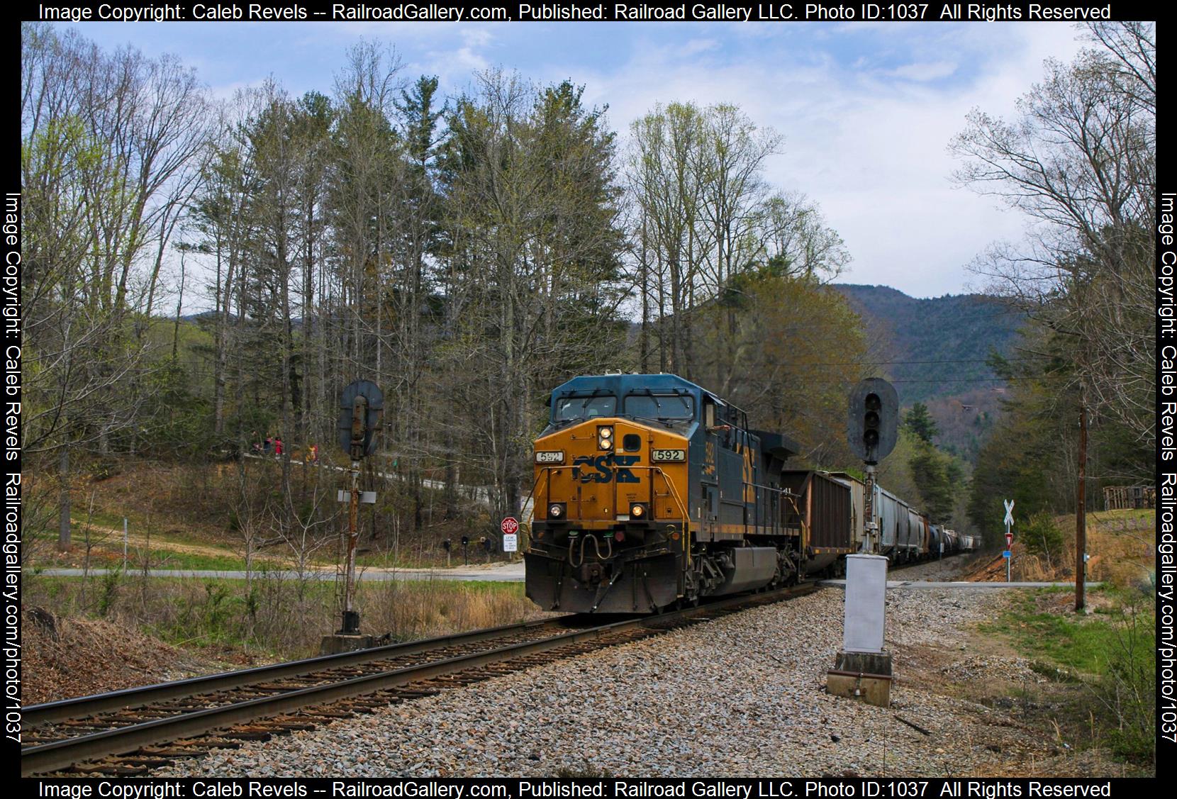 CSXT 592 is a class GE AC4400CW and  is pictured in Ashford, North Carolina, USA.  This was taken along the CSX Blue Ridge Subdivision  on the CSX Transportation. Photo Copyright: Caleb Revels uploaded to Railroad Gallery on 05/05/2023. This photograph of CSXT 592 was taken on Monday, April 03, 2023. All Rights Reserved. 