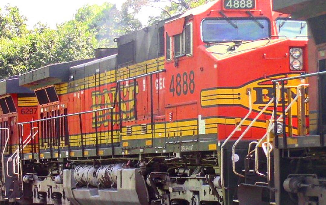 GECX 4888 is a class GE C44-9W (Dash 9-44CW) and  is pictured in Woodlawn, Illinois, USA.  This was taken along the BNSF Beardstown subdivision on the BNSF Railway. Photo Copyright: Blaise Lambert uploaded to Railroad Gallery on 05/07/2023. This photograph of GECX 4888 was taken on Thursday, August 25, 2022. All Rights Reserved. 