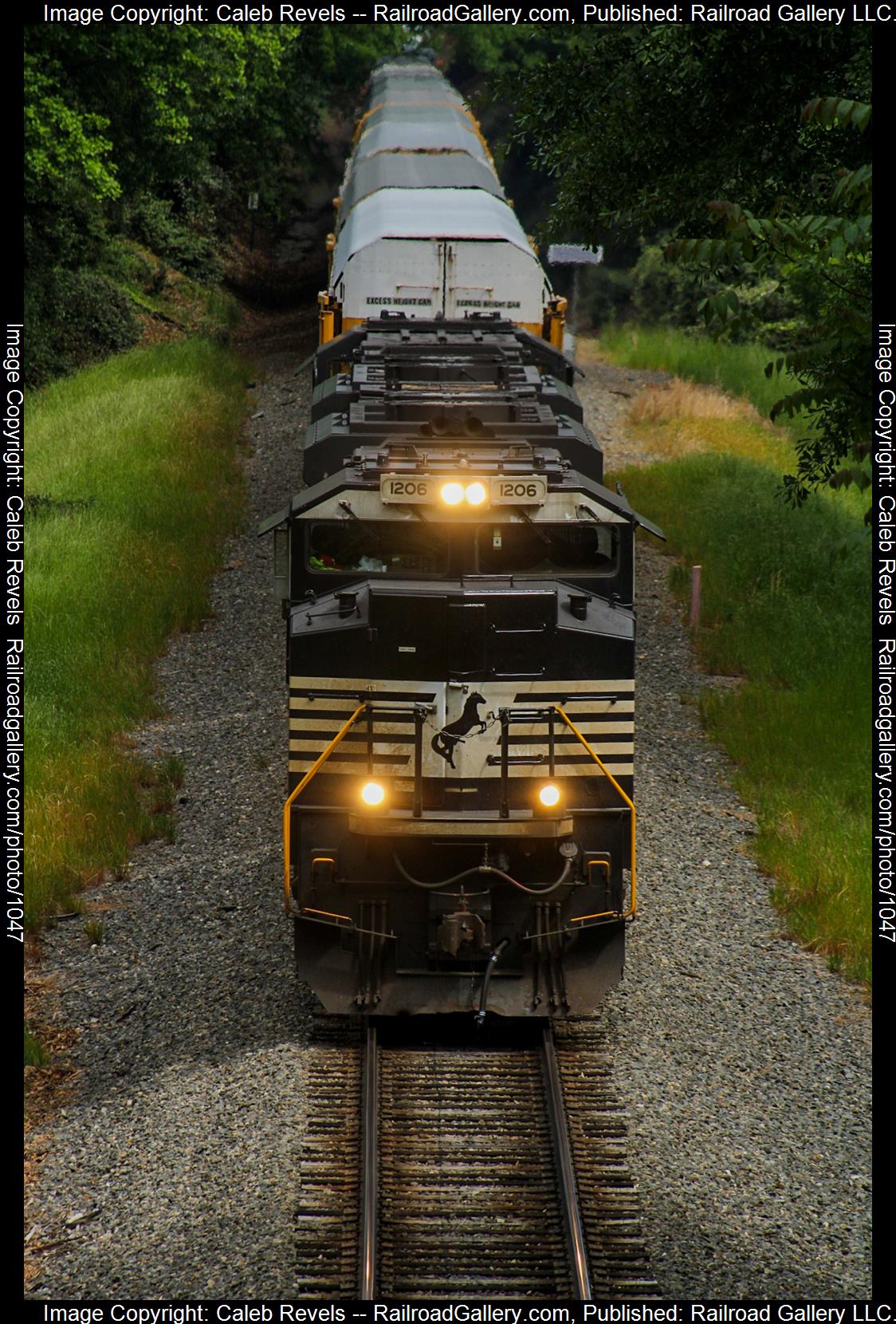 NS 1206 is a class EMD SD70ACe and  is pictured in Spartanburg, South Carolina, USA.  This was taken along the Norfolk Southern W Line  on the Norfolk Southern. Photo Copyright: Caleb Revels uploaded to Railroad Gallery on 05/08/2023. This photograph of NS 1206 was taken on Saturday, May 06, 2023. All Rights Reserved. 