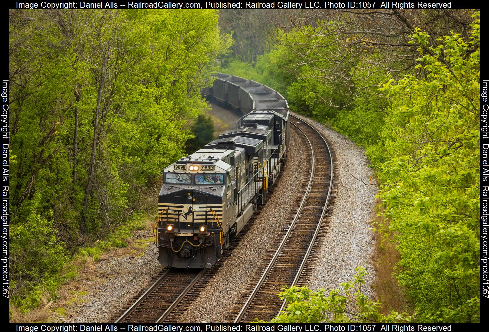 NS 9899 is a class Dash 9 and  is pictured in Elliston, Virginia, United States.  This was taken along the Christiansburg District  on the Norfolk Southern. Photo Copyright: Daniel Alls uploaded to Railroad Gallery on 05/10/2023. This photograph of NS 9899 was taken on Wednesday, May 10, 2023. All Rights Reserved. 