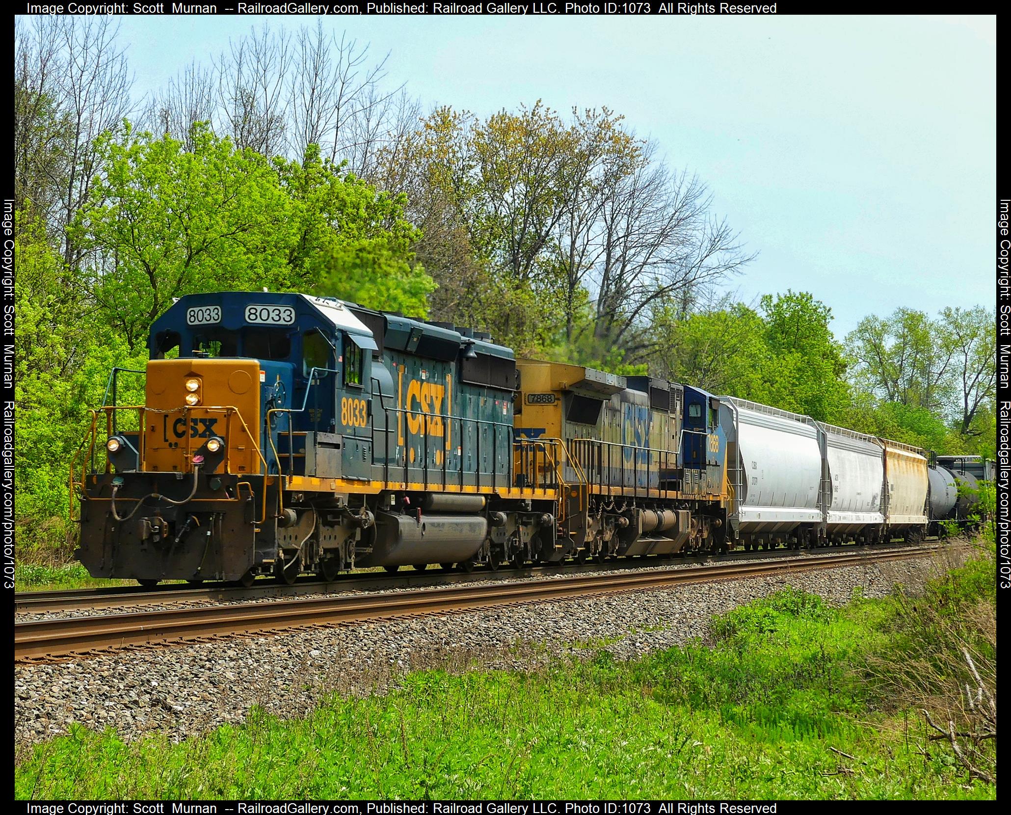 CSX 8033 is a class EMD SD40-2 and  is pictured in Perinton , New York, United States.  This was taken along the Rochester Subdivision  on the CSX Transportation. Photo Copyright: Scott  Murnan  uploaded to Railroad Gallery on 05/15/2023. This photograph of CSX 8033 was taken on Monday, May 15, 2023. All Rights Reserved. 