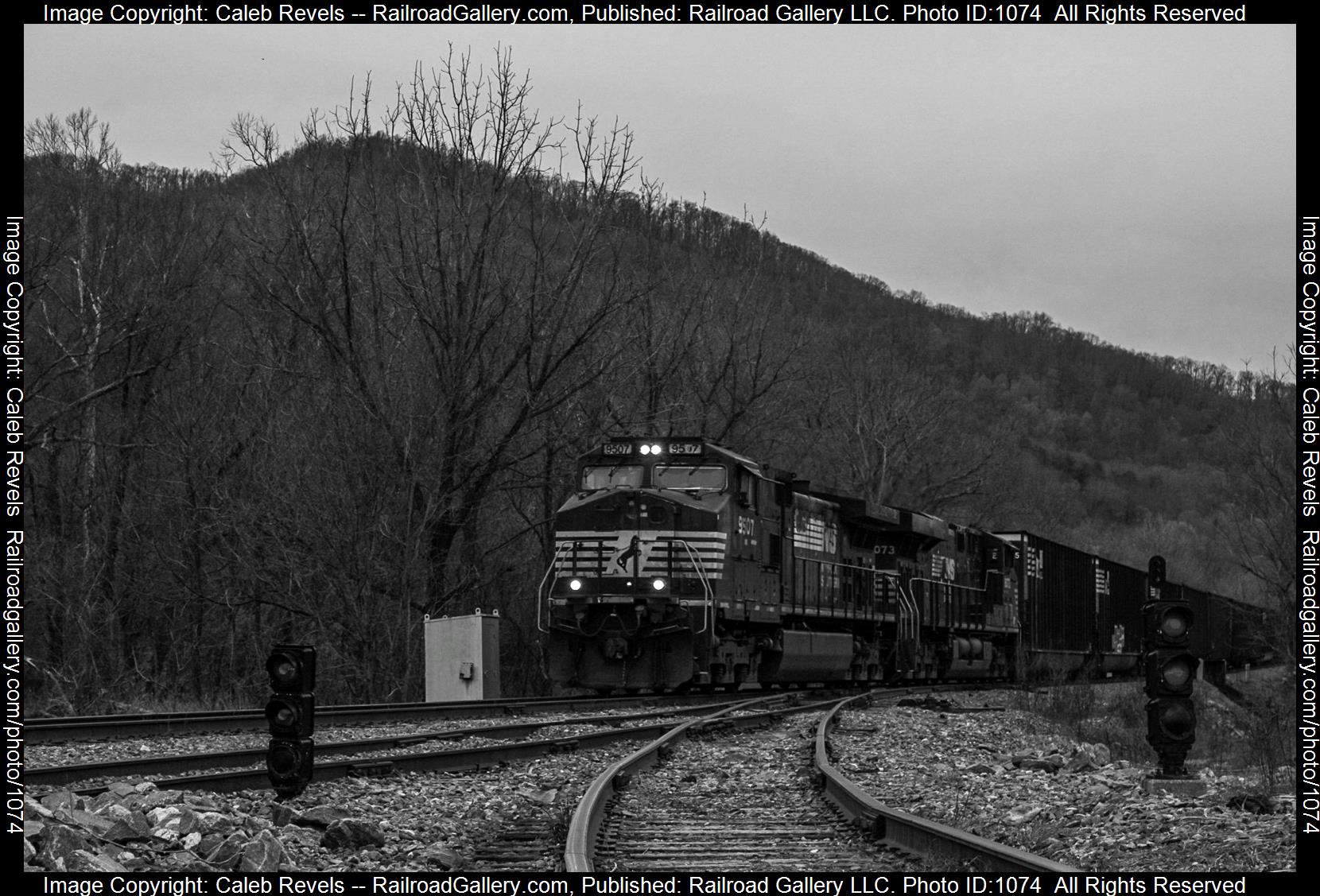 NS 9507 is a class GE C44-9W (Dash 9-44CW) and  is pictured in Black Mountain , North Carolina, USA.  This was taken along the Norfolk Southern S Line on the Norfolk Southern. Photo Copyright: Caleb Revels uploaded to Railroad Gallery on 05/16/2023. This photograph of NS 9507 was taken on Monday, April 03, 2023. All Rights Reserved. 