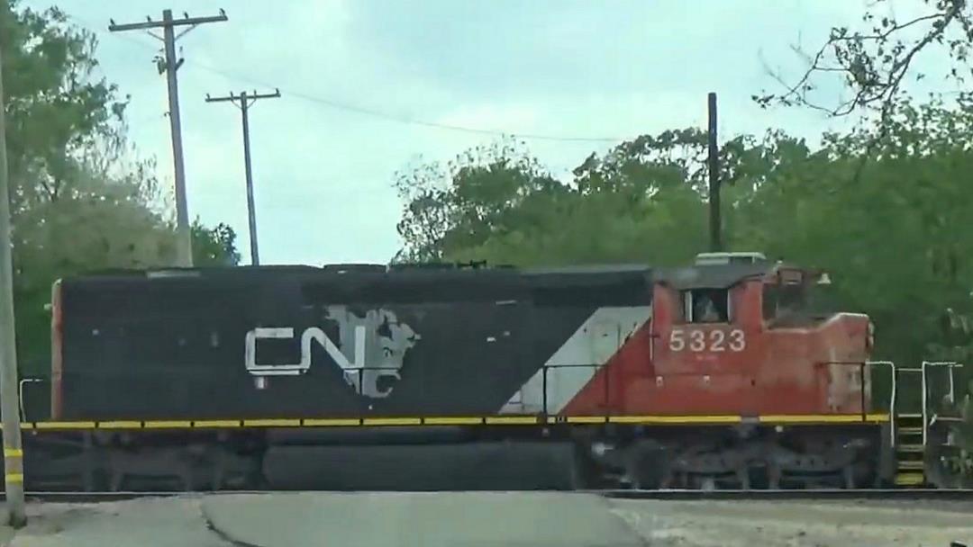 CN 5323 is a class EMD SD40-2W and  is pictured in Centralia, Illinois, USA.  This was taken along the CN Centralia subdivision on the Canadian National Railway. Photo Copyright: Blaise Lambert uploaded to Railroad Gallery on 05/16/2023. This photograph of CN 5323 was taken on Thursday, May 14, 2020. All Rights Reserved. 