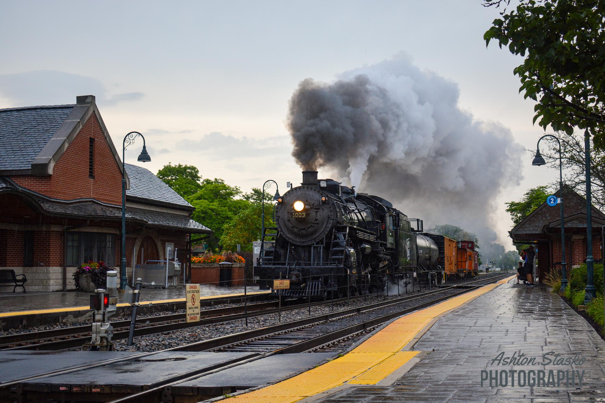 1003 is a class "L-1" 2-8-2 "Mikado"  and  is pictured in Glenview , Illinois , United States .  This was taken along the Milwaukee District  on the METRA . Photo Copyright: Ashton  Stasko  uploaded to Railroad Gallery on 11/15/2022. This photograph of 1003 was taken on Saturday, August 06, 2022. All Rights Reserved. 