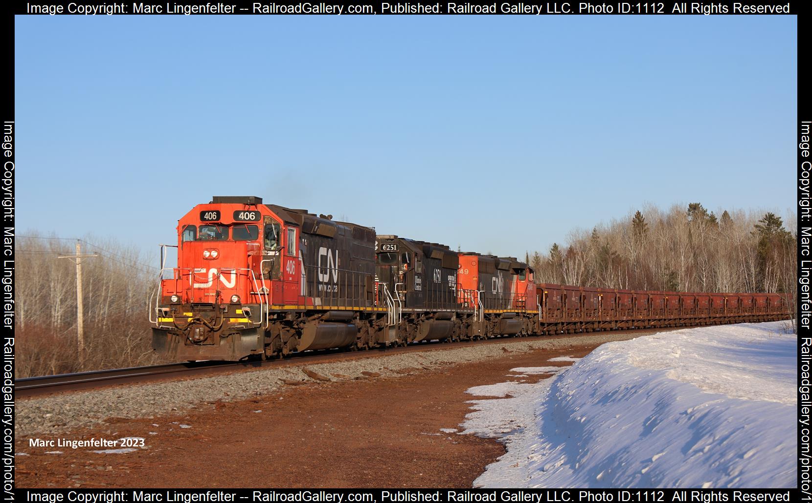 CN 406 is a class EMD SD40-3 and  is pictured in Burnett, Minnesota, USA.  This was taken along the CN Missabe Sub on the Canadian National Railway. Photo Copyright: Marc Lingenfelter uploaded to Railroad Gallery on 06/04/2023. This photograph of CN 406 was taken on Wednesday, March 29, 2023. All Rights Reserved. 