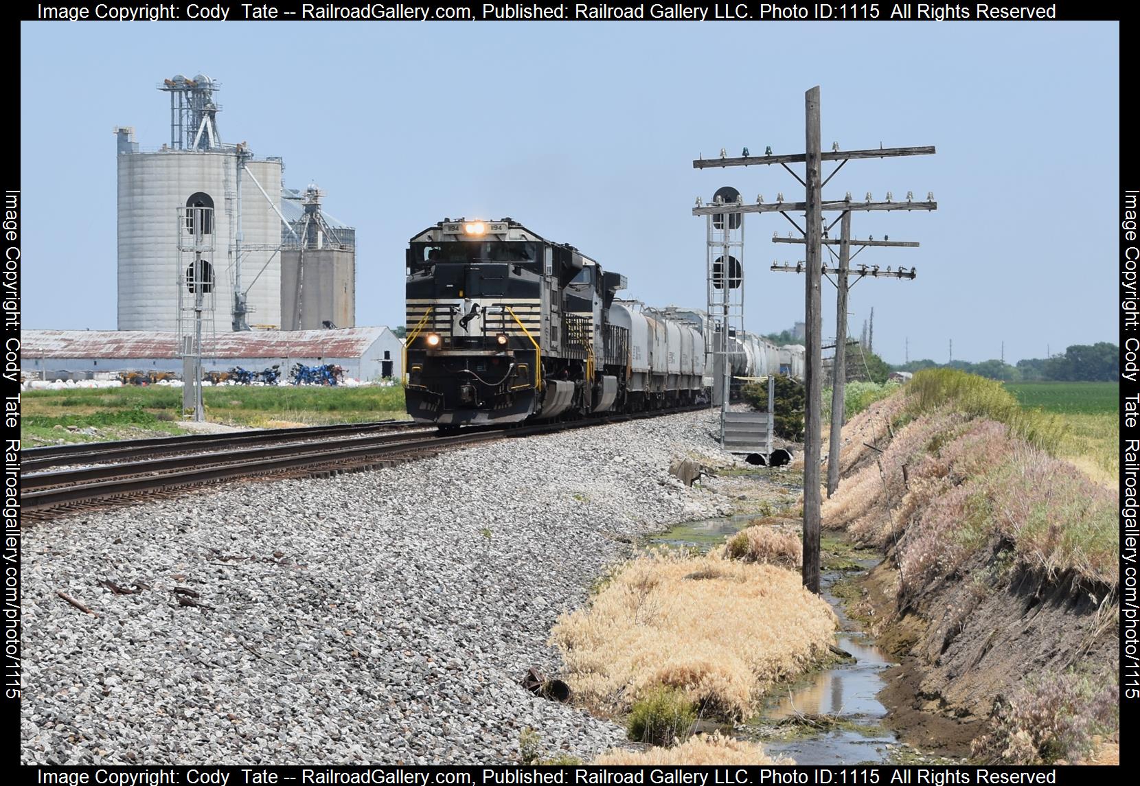 NS 1194 is a class SD70ACe and  is pictured in Tolono , Illinois, USA.  This was taken along the Lafayette district on the Norfolk Southern. Photo Copyright: Cody  Tate uploaded to Railroad Gallery on 06/04/2023. This photograph of NS 1194 was taken on Saturday, June 03, 2023. All Rights Reserved. 