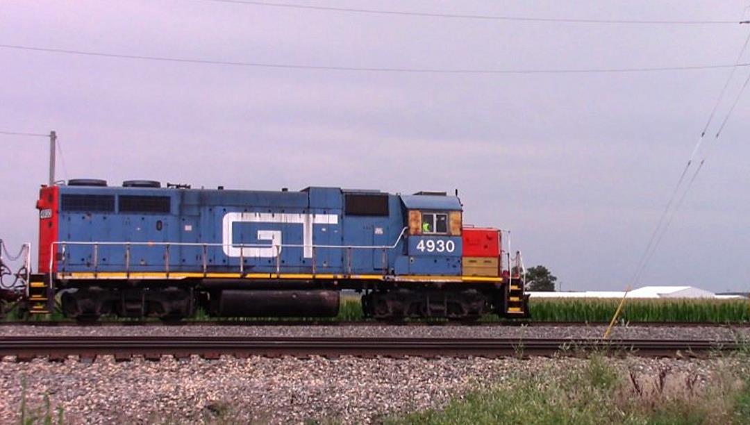 GTW 4930 is a class EMD GP38-2 and  is pictured in Irvington, Illinois, USA.  This was taken along the CN Centralia subdivision on the Grand Trunk. Photo Copyright: Blaise Lambert uploaded to Railroad Gallery on 06/09/2023. This photograph of GTW 4930 was taken on Friday, July 15, 2022. All Rights Reserved. 
