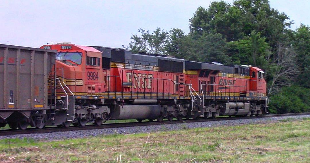 BNSF 9984 is a class EMD SD70MAC and  is pictured in Woodlawn, Illinois, USA.  This was taken along the BNSF Beardstown subdivision on the BNSF Railway. Photo Copyright: Blaise Lambert uploaded to Railroad Gallery on 06/13/2023. This photograph of BNSF 9984 was taken on Sunday, June 11, 2023. All Rights Reserved. 