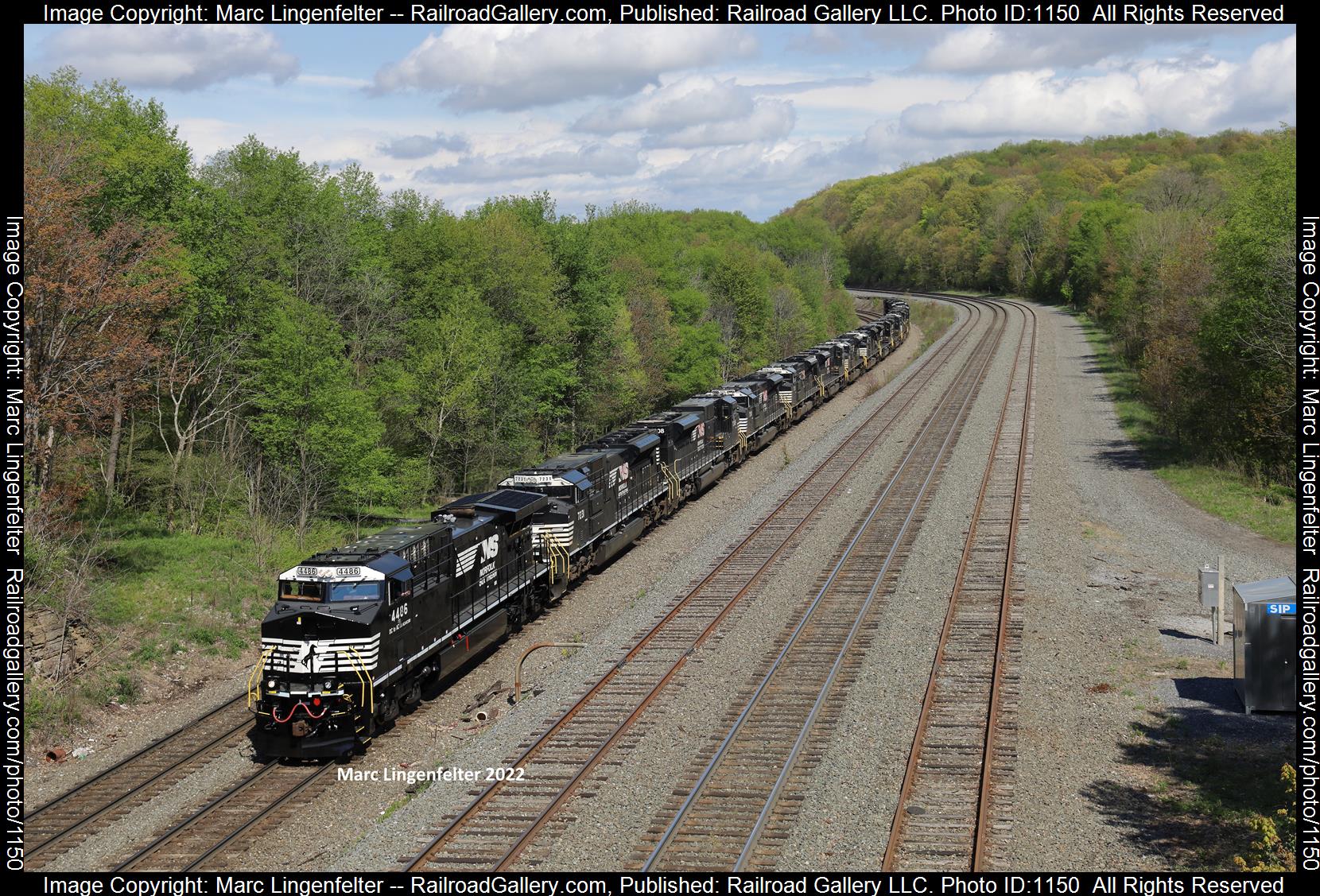 NS 4486 is a class GE AC44C6M and  is pictured in Gallitzin, Pennsylvania, USA.  This was taken along the NS Pittsburgh Line on the Norfolk Southern. Photo Copyright: Marc Lingenfelter uploaded to Railroad Gallery on 06/19/2023. This photograph of NS 4486 was taken on Sunday, May 16, 2021. All Rights Reserved. 