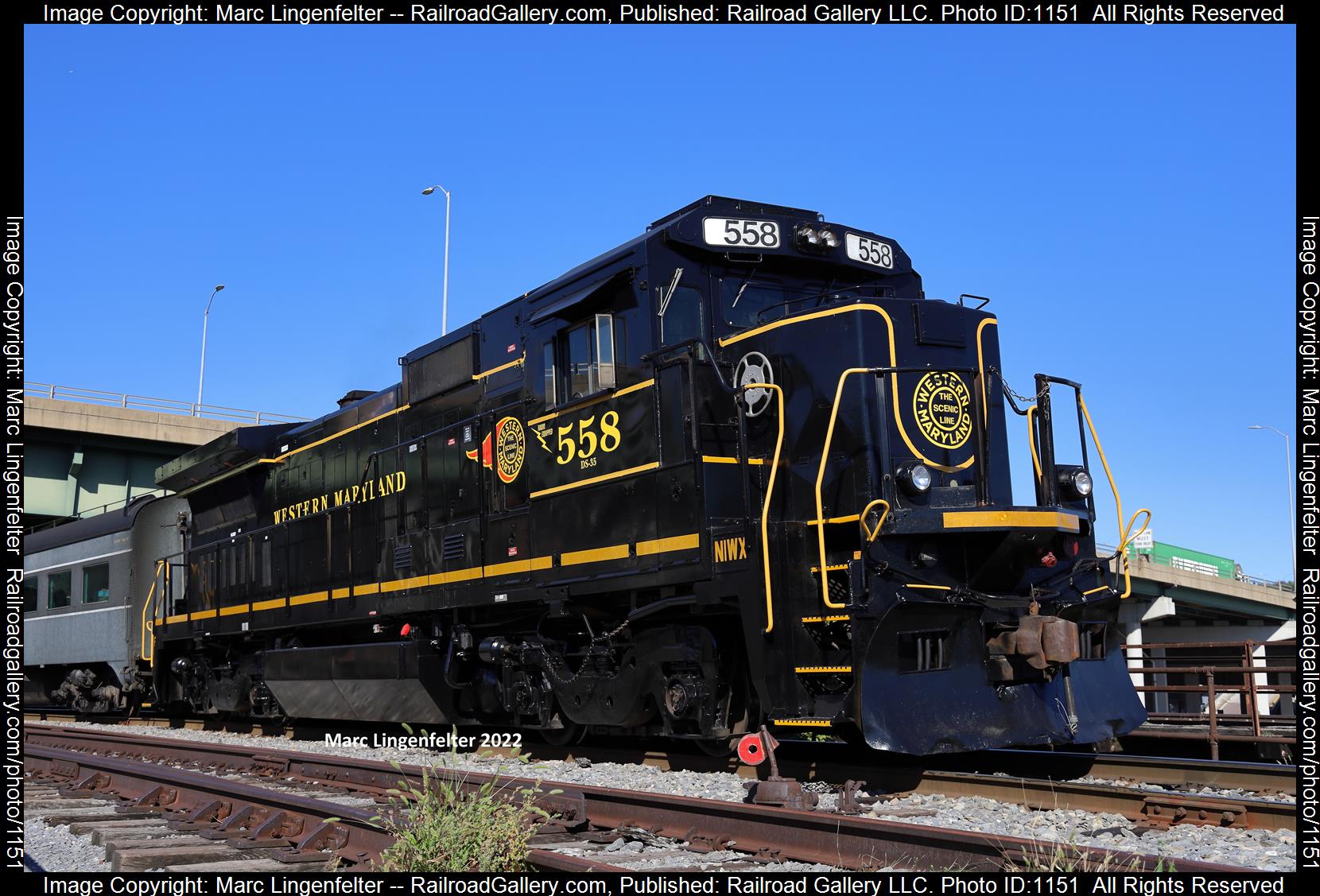 WMSR 558 is a class GE B32-8 (Dash 8-32B) and  is pictured in Cumberland, Maryland, USA.  This was taken along the WMSR Mainline Station on the Western Maryland Scenic Railroad. Photo Copyright: Marc Lingenfelter uploaded to Railroad Gallery on 06/19/2023. This photograph of WMSR 558 was taken on Friday, September 23, 2022. All Rights Reserved. 