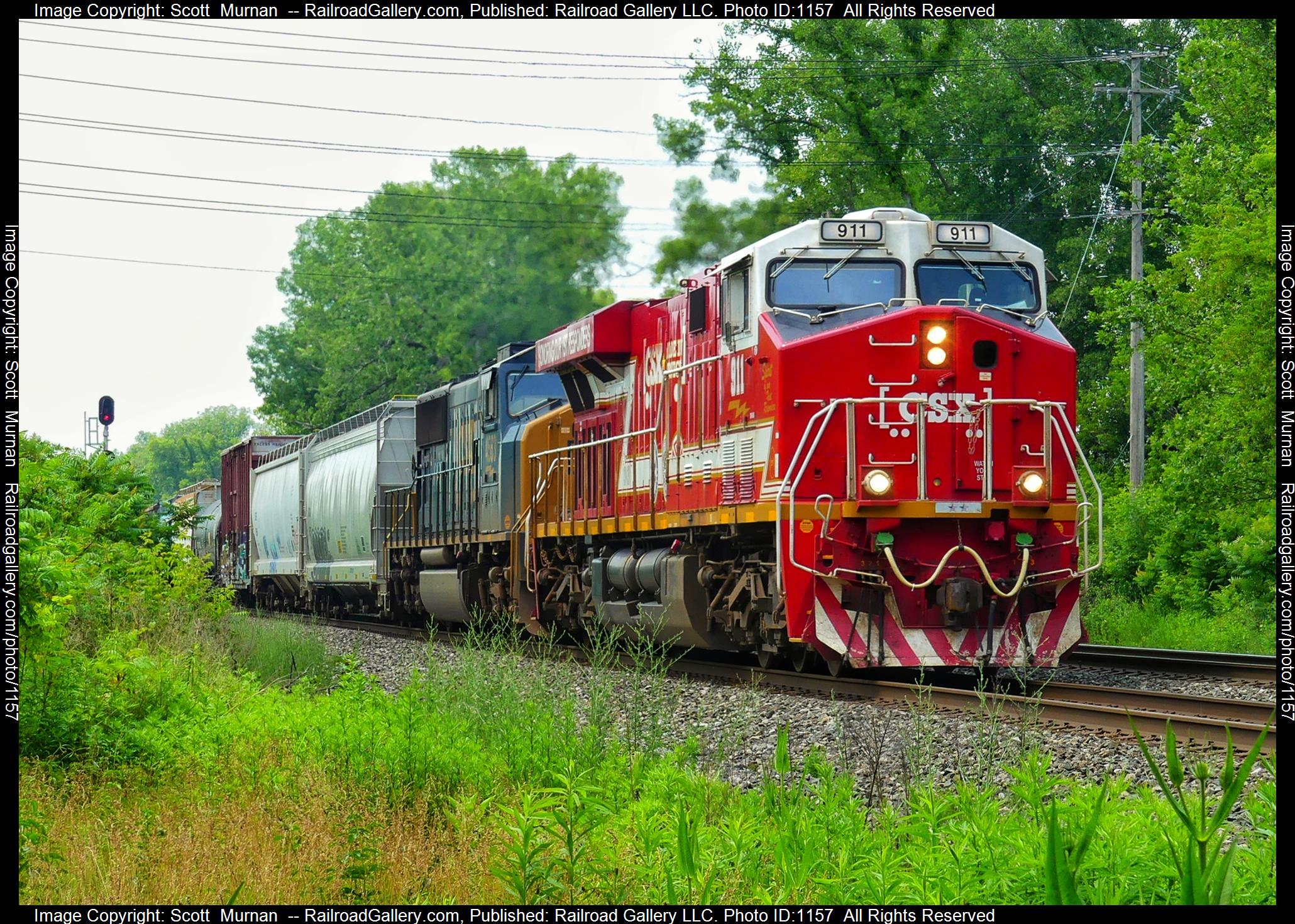 CSX 911 is a class GE ES44AC and  is pictured in Perinton , New York, United States.  This was taken along the Rochester Subdivision  on the CSX Transportation. Photo Copyright: Scott  Murnan  uploaded to Railroad Gallery on 06/21/2023. This photograph of CSX 911 was taken on Wednesday, June 21, 2023. All Rights Reserved. 
