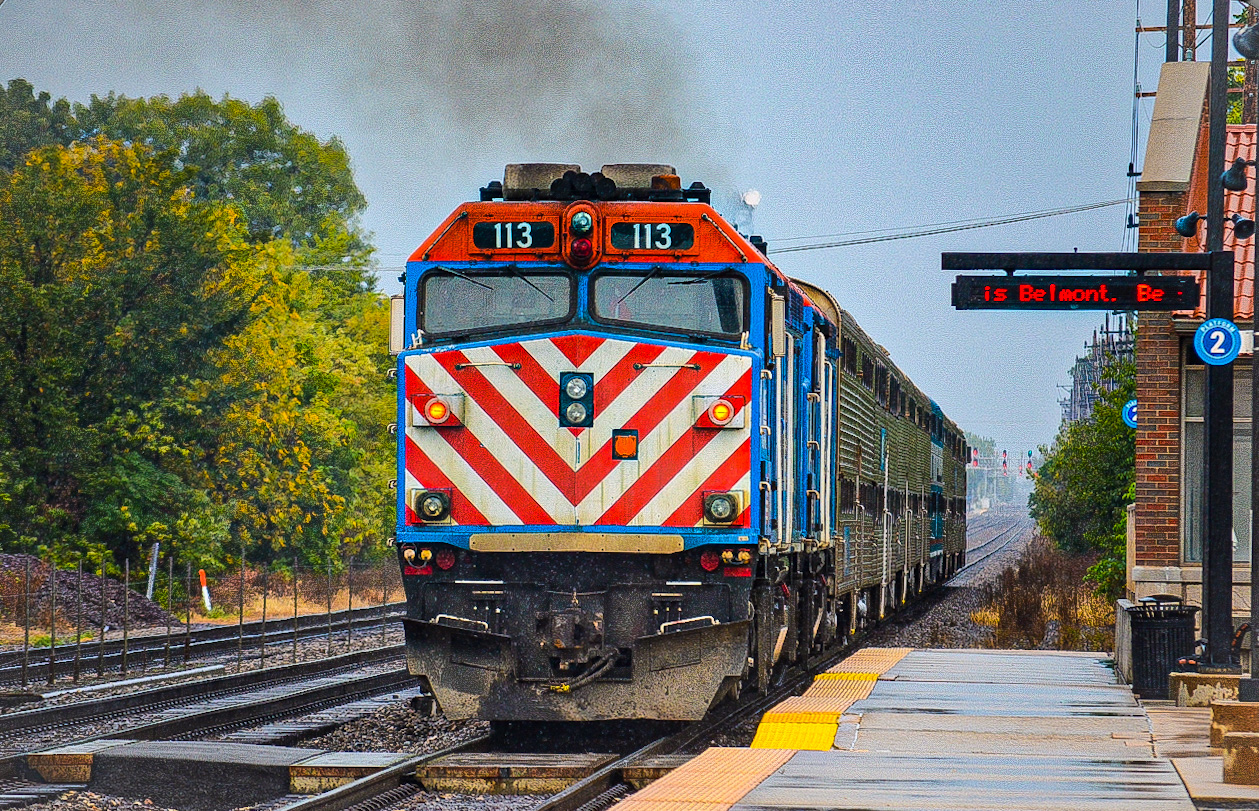 113 is a class F40PH  and  is pictured in Downers Grove , Illinois , United States .  This was taken along the Aurora Subdivision  on the METRA . Photo Copyright: Ashton  Stasko  uploaded to Railroad Gallery on 11/15/2022. This photograph of 113 was taken on Saturday, July 17, 2021. All Rights Reserved. 