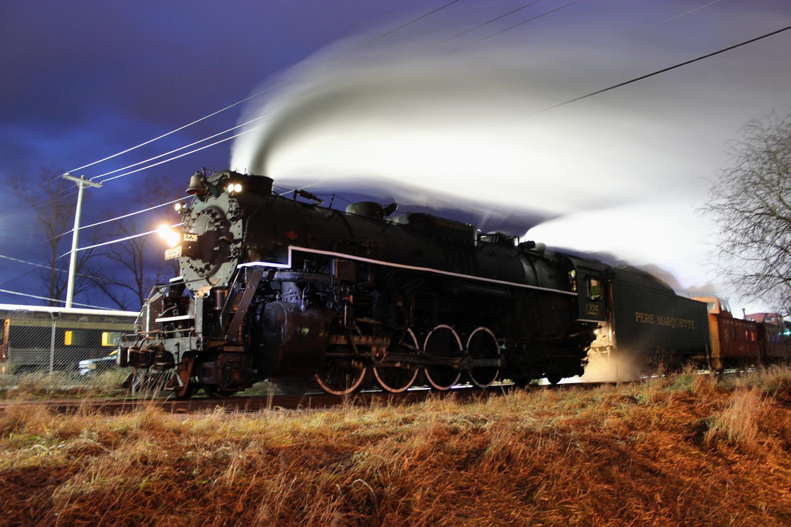 Pere Marquette 1225 is a class 2-8-4 Berkshire  and  is pictured in Owosso, Michigan , United states.  This was taken along the N/A on the Pere Marquette. Photo Copyright: Michael Carlson uploaded to Railroad Gallery on 11/15/2022. This photograph of Pere Marquette 1225 was taken on Friday, December 10, 2021. All Rights Reserved. 