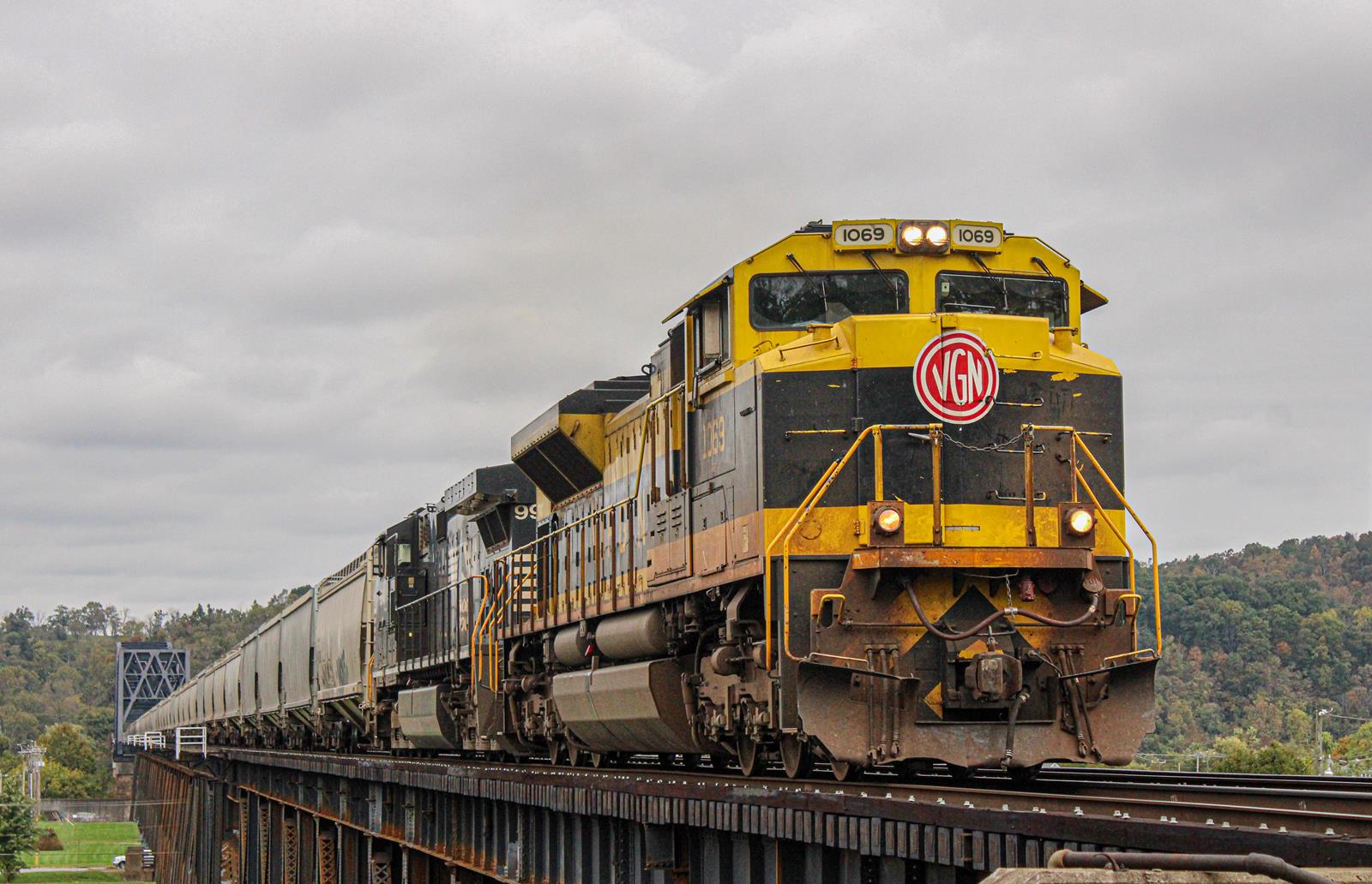 NS 1069 is a class SD70ACe and  is pictured in Kenova, West Virginia, USA.  This was taken along the Kenova District  on the Norfolk Southern. Photo Copyright: Austin  West uploaded to Railroad Gallery on 11/17/2022. This photograph of NS 1069 was taken on Friday, October 22, 2021. All Rights Reserved. 