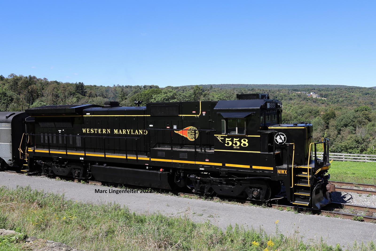 WMSR 558 is a class GE B32-8 (Dash 8-32B) and  is pictured in Frostburg, MD, USA.  This was taken along the WMSR Main Line on the Western Maryland Scenic Railroad. Photo Copyright: Marc Lingenfelter uploaded to Railroad Gallery on 11/18/2022. This photograph of WMSR 558 was taken on Friday, September 23, 2022. All Rights Reserved. 