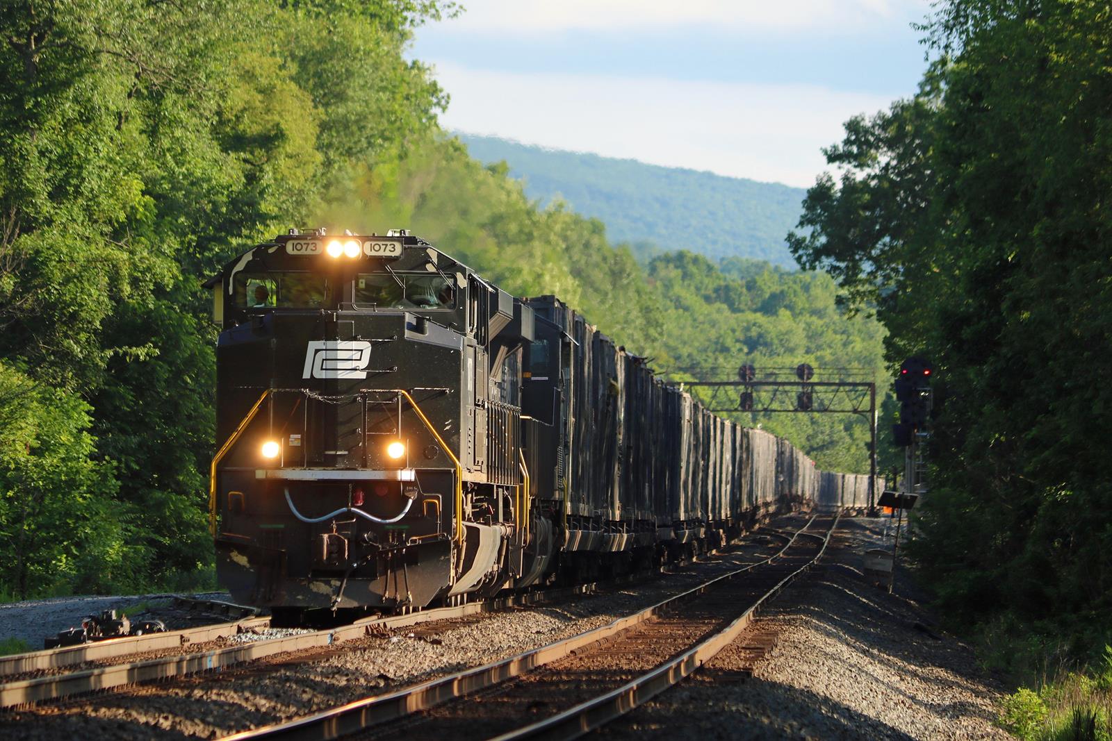 NS 1073 is a class EMD SD70ACe and  is pictured in Torrance, Pennsylvania, USA.  This was taken along the Pittsburgh Line on the Norfolk Southern. Photo Copyright: Adam Klimchock uploaded to Railroad Gallery on 11/10/2022. This photograph of NS 1073 was taken on Wednesday, June 27, 2018. All Rights Reserved. 