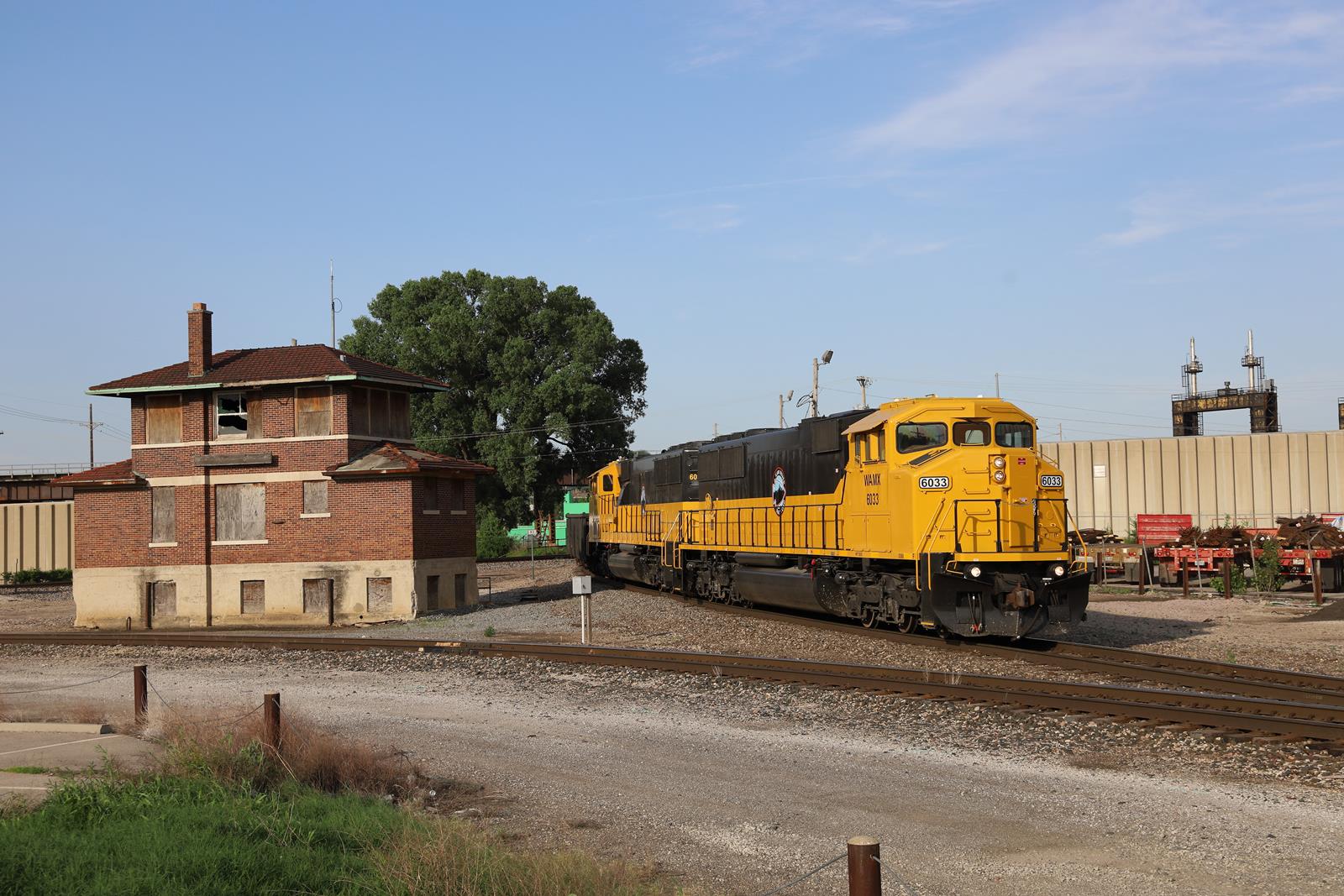 WAMX 6033 is a class EMD SD60M and  is pictured in Kansas City, Kansas, USA.  This was taken along the Kansas City Terminal on the Kaw River Railroad. Photo Copyright: Marc Lingenfelter uploaded to Railroad Gallery on 11/21/2022. This photograph of WAMX 6033 was taken on Sunday, June 12, 2022. All Rights Reserved. 