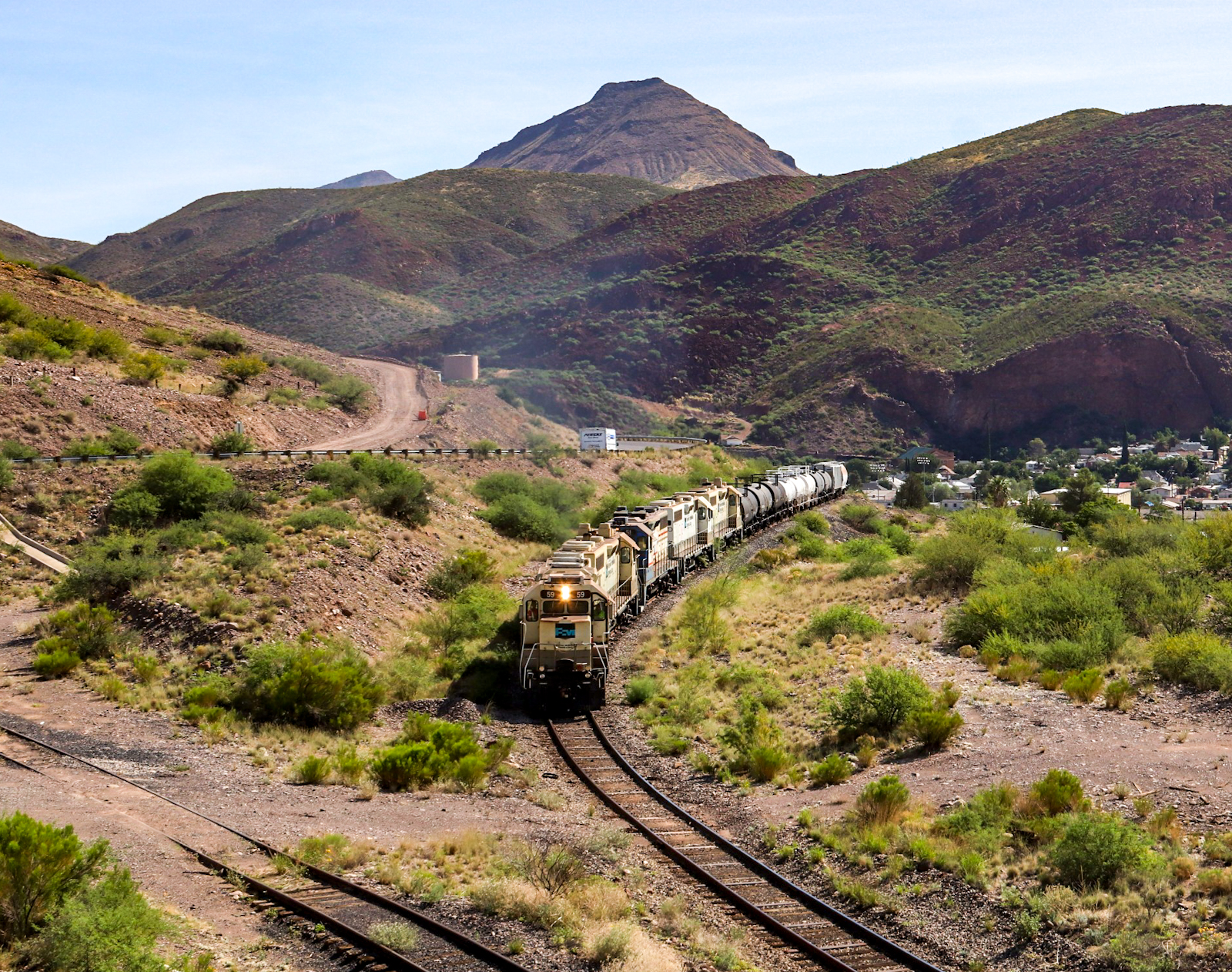 PHDX 59 is a class EMD GP38-2 and  is pictured in Clifton, Arizona, USA.  This was taken along the Freeport McMoRan on the Freeport McMoRan. Photo Copyright: Lawrence Amaloo uploaded to Railroad Gallery on 11/22/2022. This photograph of PHDX 59 was taken on Tuesday, July 19, 2022. All Rights Reserved. 