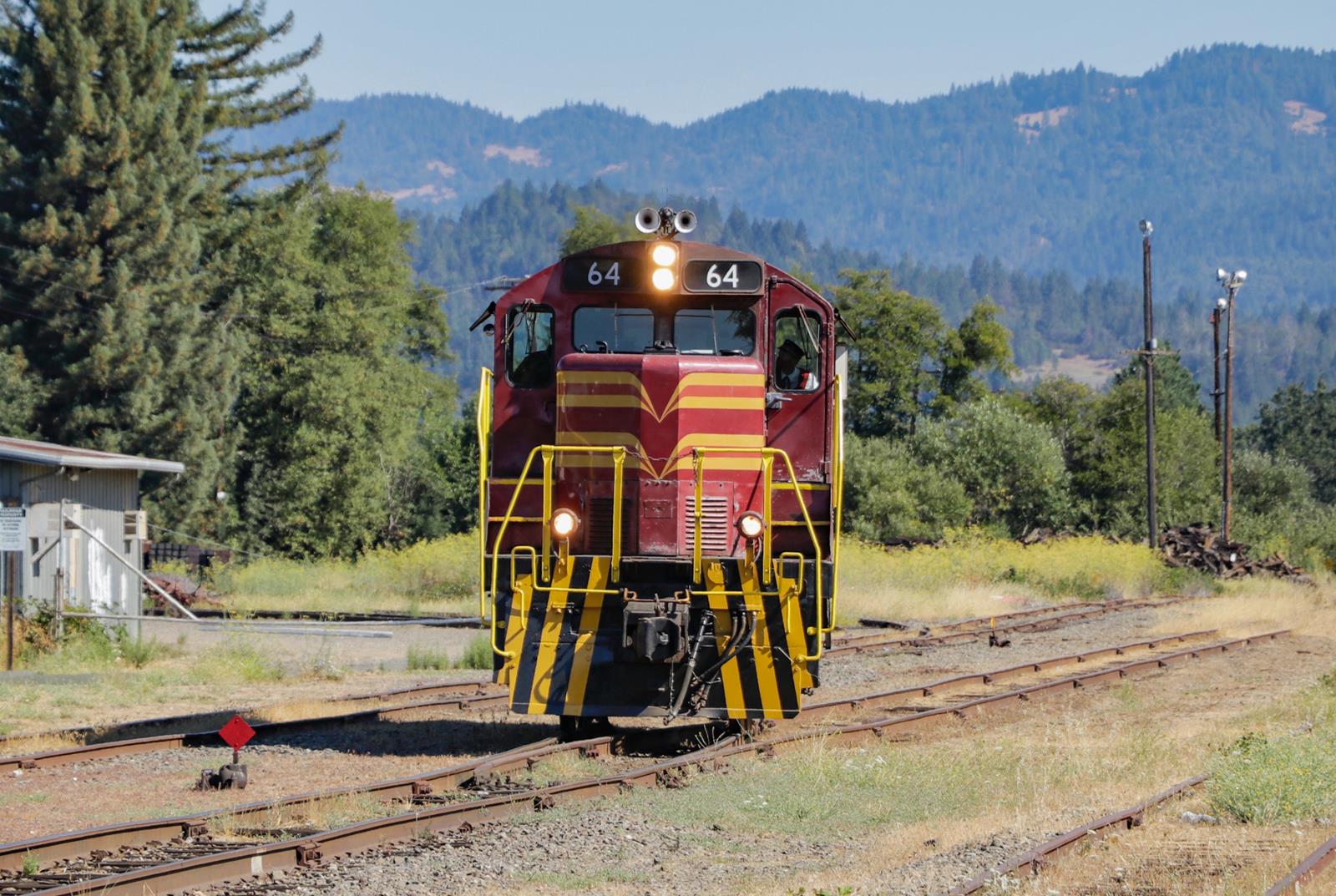 CWR 64 is a class EMD GP9 and  is pictured in Willits, California, USA.  This was taken along the California Western Railroad on the California Western Railroad. Photo Copyright: Casey Naton uploaded to Railroad Gallery on 11/22/2022. This photograph of CWR 64 was taken on Thursday, August 05, 2021. All Rights Reserved. 