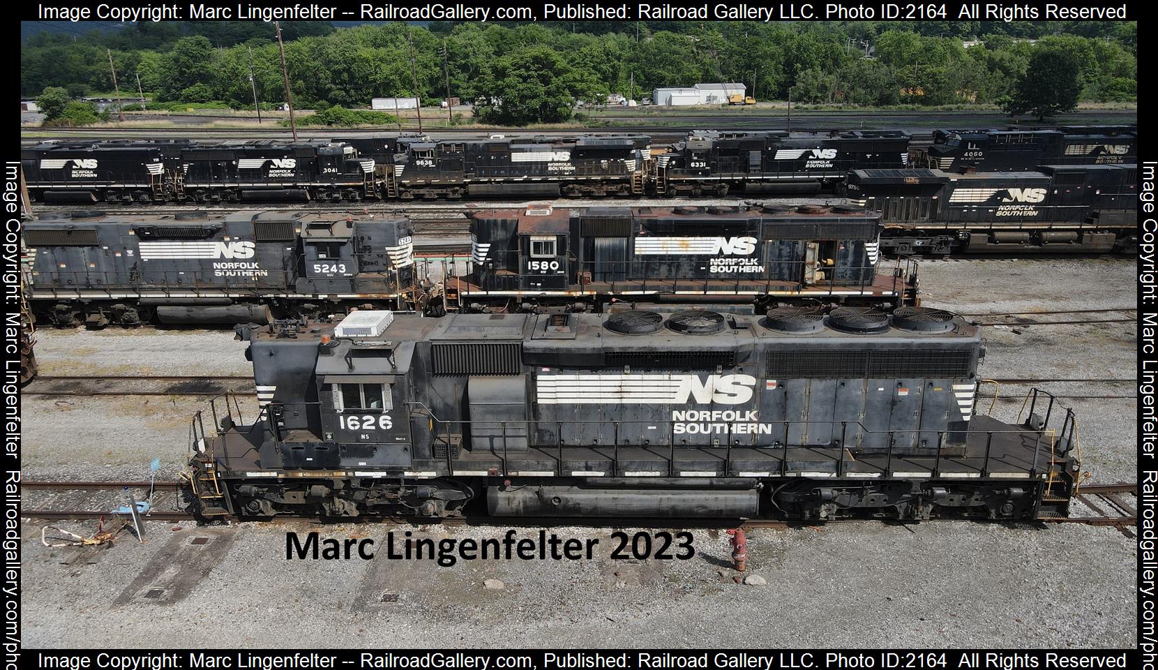 NS 1626 is a class EMD SD40-2 and  is pictured in Altoona, Pennsylvania, USA.  This was taken along the NS Juniata Shops on the Norfolk Southern. Photo Copyright: Marc Lingenfelter uploaded to Railroad Gallery on 06/26/2023. This photograph of NS 1626 was taken on Sunday, June 25, 2023. All Rights Reserved. 