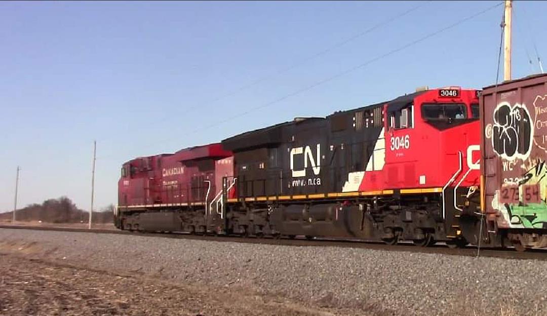 CN 3046 is a class GE ET44AC and  is pictured in Irvington, Illinois, USA.  This was taken along the CN Centralia subdivision on the Canadian National Railway. Photo Copyright: Blaise Lambert uploaded to Railroad Gallery on 06/27/2023. This photograph of CN 3046 was taken on Sunday, February 05, 2023. All Rights Reserved. 