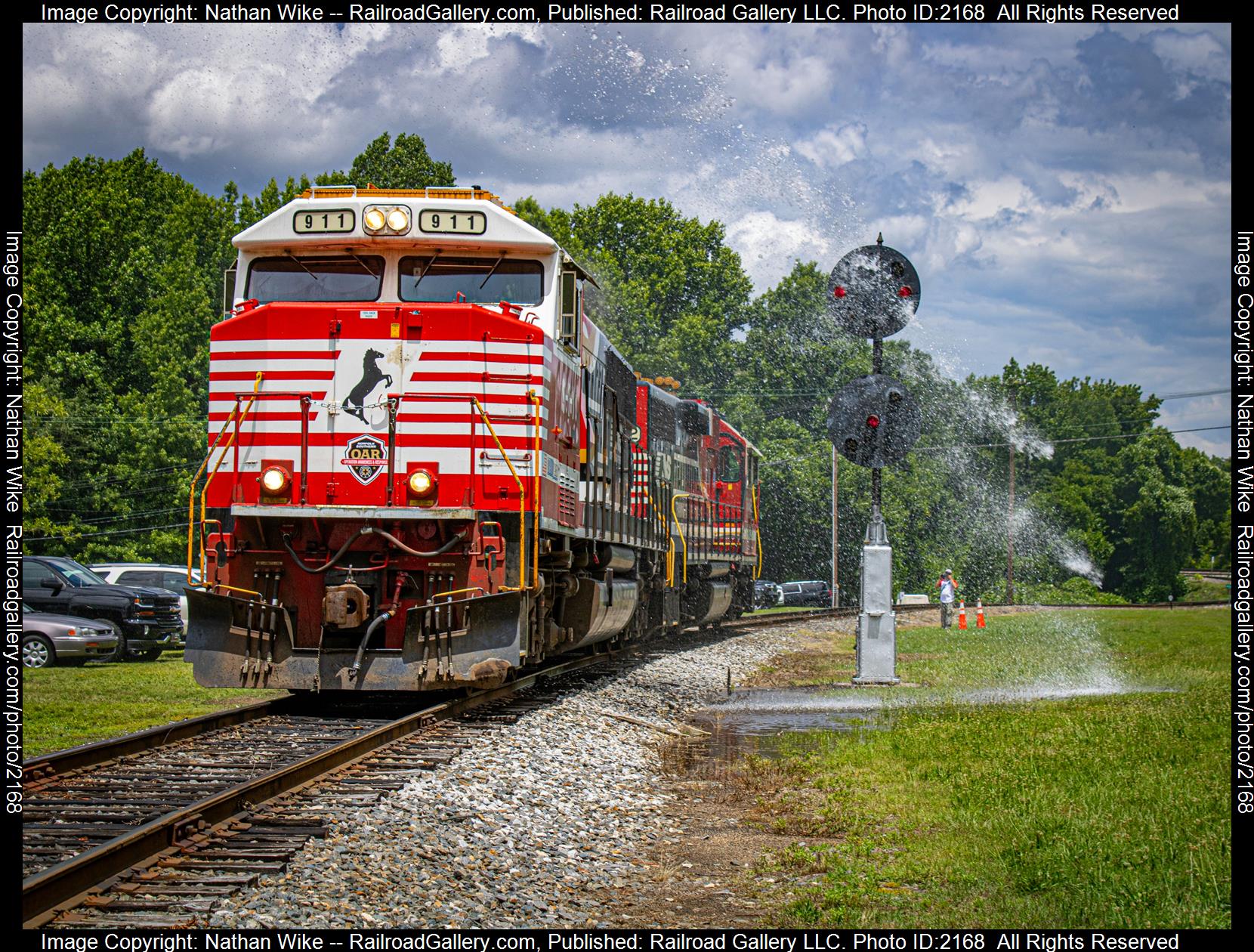 NS 911 is a class sd60e and  is pictured in Spencer, North Carolina, United States.  This was taken along the North Caroline Transportation Museum  on the Norfolk Southern. Photo Copyright: Nathan Wike uploaded to Railroad Gallery on 06/28/2023. This photograph of NS 911 was taken on Saturday, June 24, 2023. All Rights Reserved. 