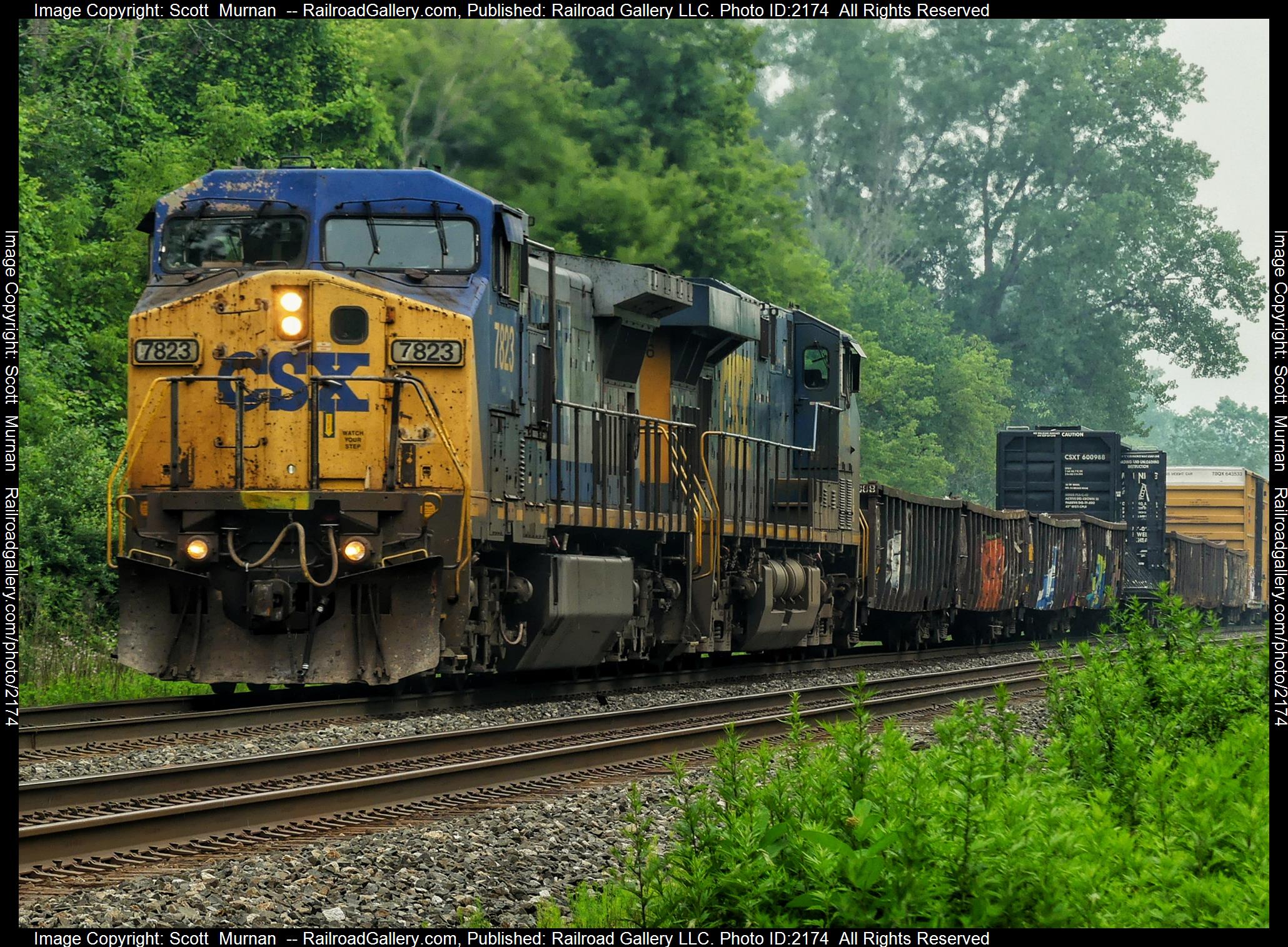 CSX 7823 is a class GE C40-8W (Dash 8-40CW) and  is pictured in Perinton , New York, United States.  This was taken along the Rochester Subdivision  on the CSX Transportation. Photo Copyright: Scott  Murnan  uploaded to Railroad Gallery on 06/30/2023. This photograph of CSX 7823 was taken on Friday, June 30, 2023. All Rights Reserved. 