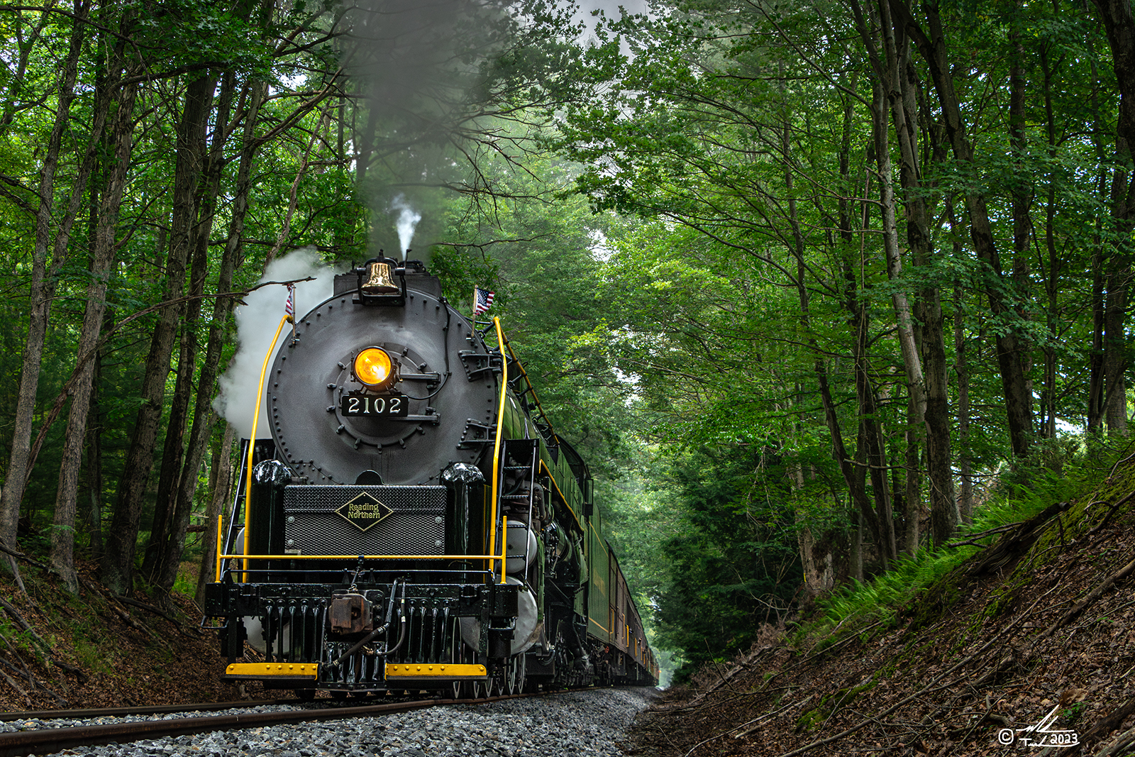 RDG 2102 is a class T-1 and  is pictured in Hometown, Pennsylvania, USA.  This was taken along the Hometown Hill on the Reading Company. Photo Copyright: Mark Turkovich uploaded to Railroad Gallery on 07/03/2023. This photograph of RDG 2102 was taken on Saturday, July 01, 2023. All Rights Reserved. 